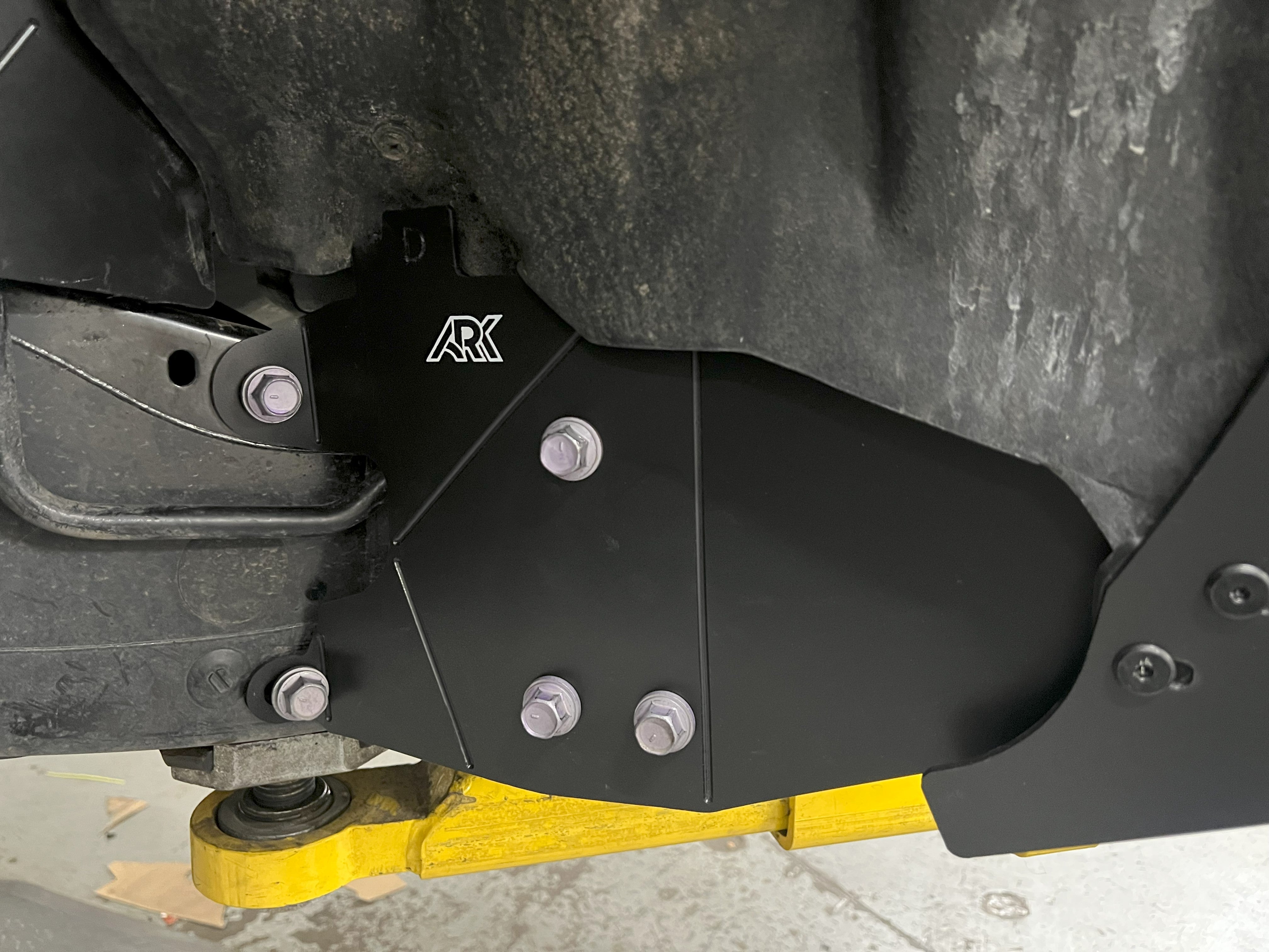 2025+ Toyota 4Runner TriXPoly Front Crash Bracket Delete showcasing a durable black metal design for enhanced offroad performance.