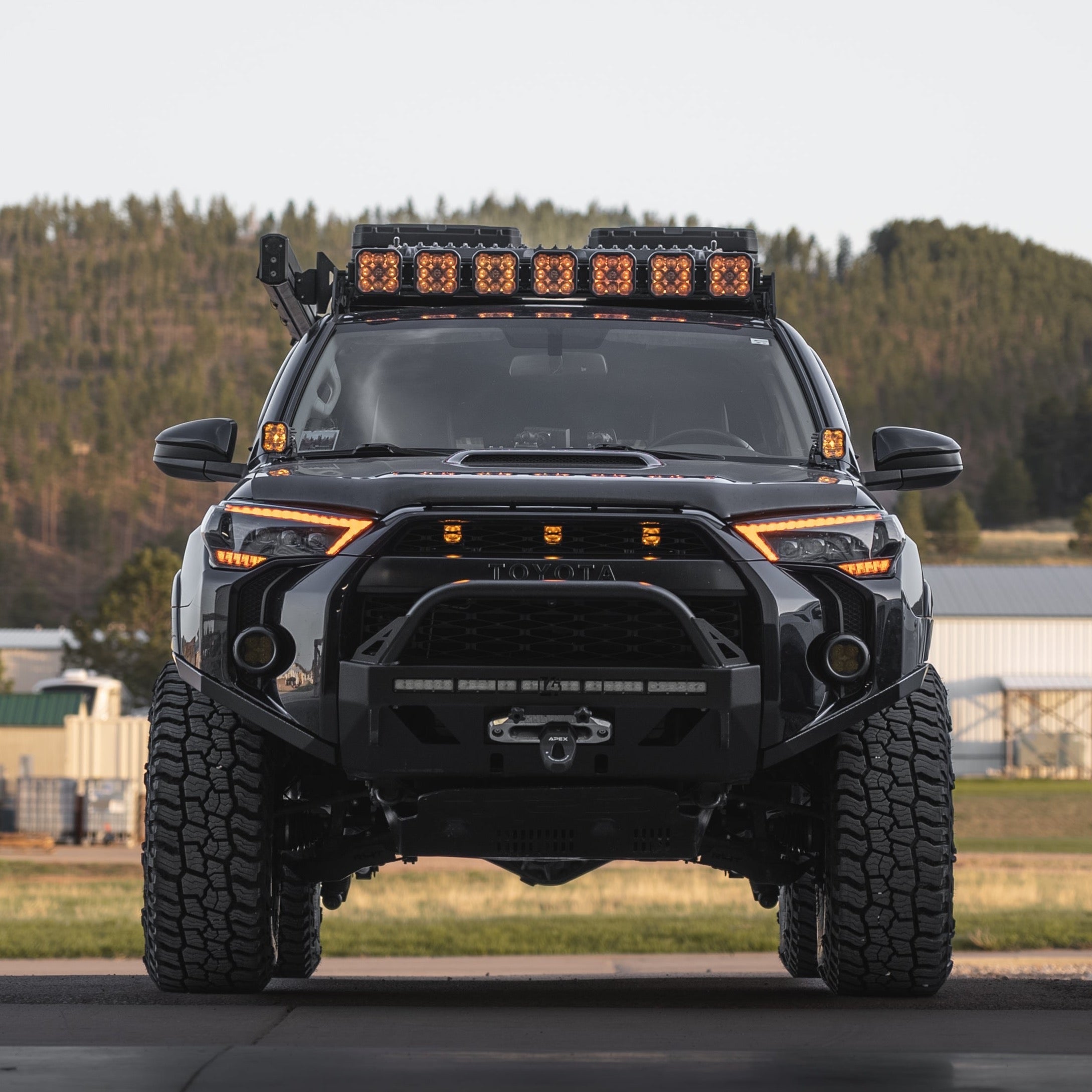 4Runner Lo-Pro winch bumper for 2014-2024 models, showcasing rugged design and off-road readiness with integrated lights.