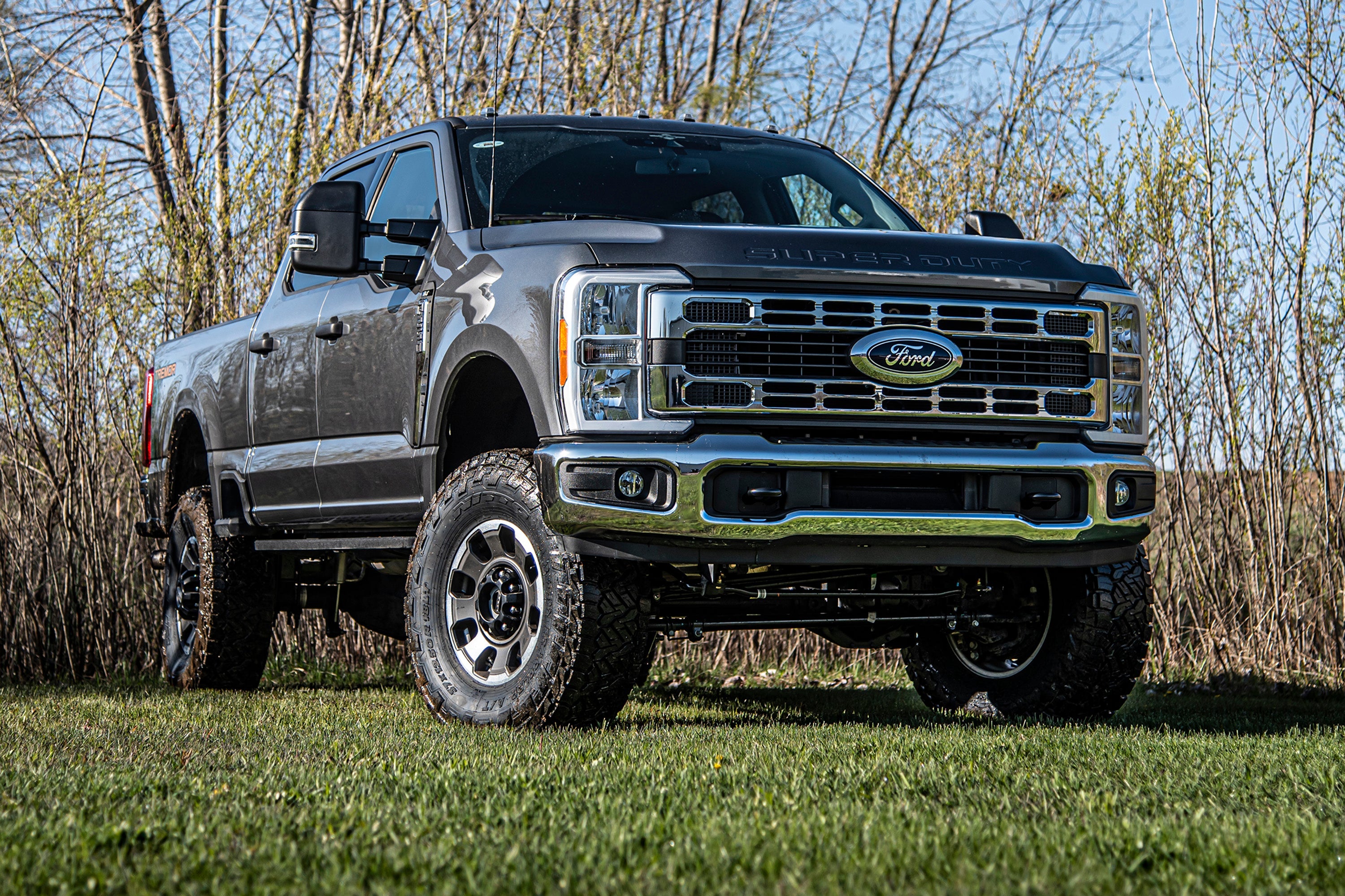 5-inch lift kit with FOX 2.5 coil-over conversion installed on a Ford F250/F350 Super Duty, showcasing enhanced off-road capability.