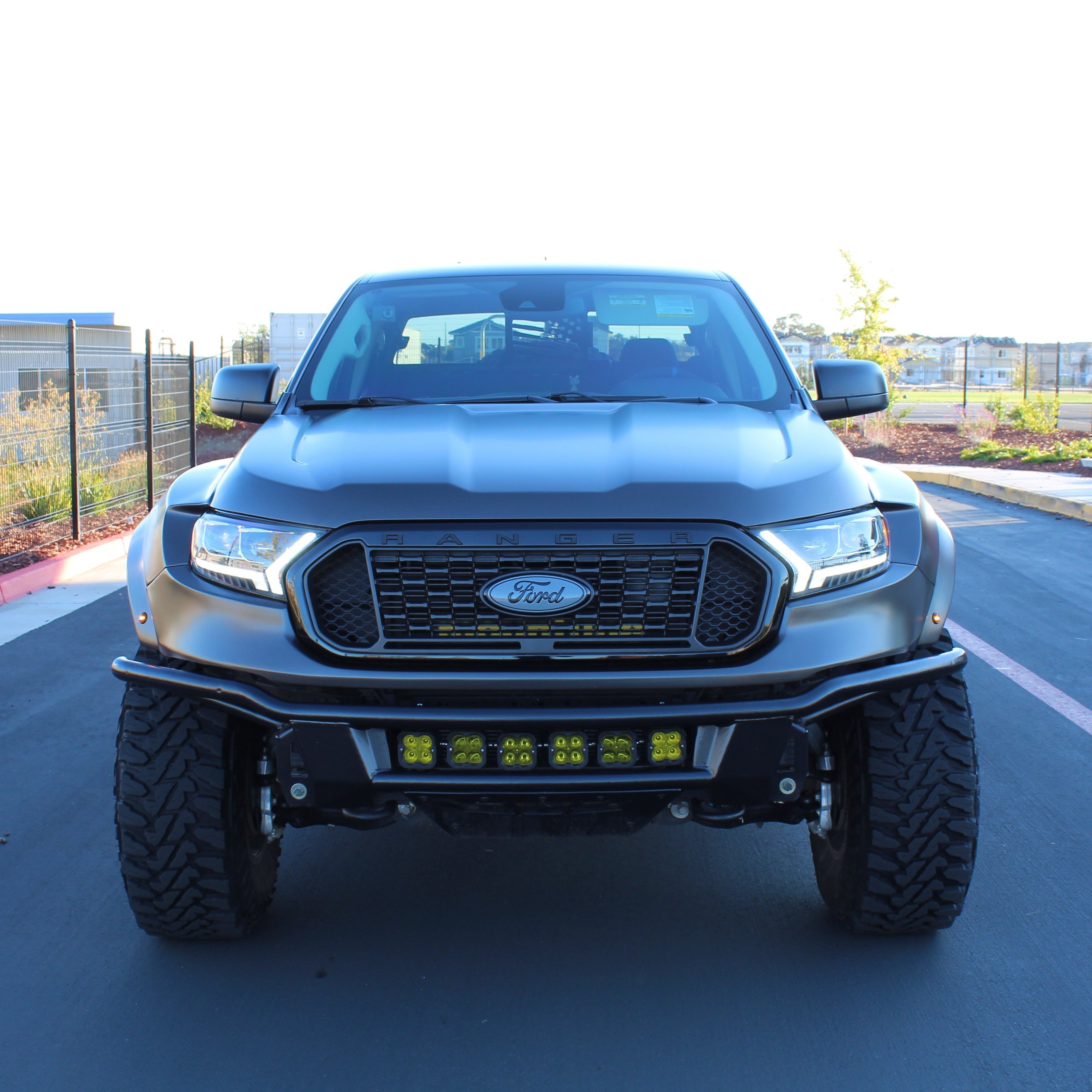 2019-2023 Ford Ranger fenders on a rugged truck with a bold front view, showcasing offroad capabilities and style.