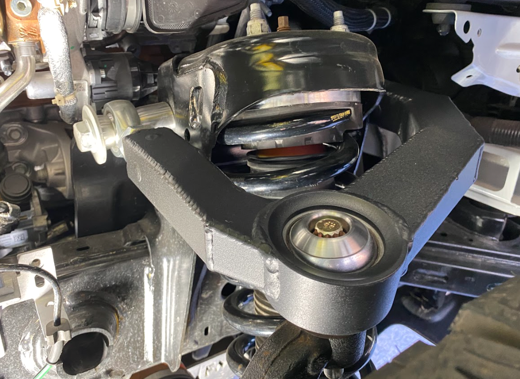 2021 and up Bronco fabricated upper arm kit showing stock length design and suspension components for enhanced performance.