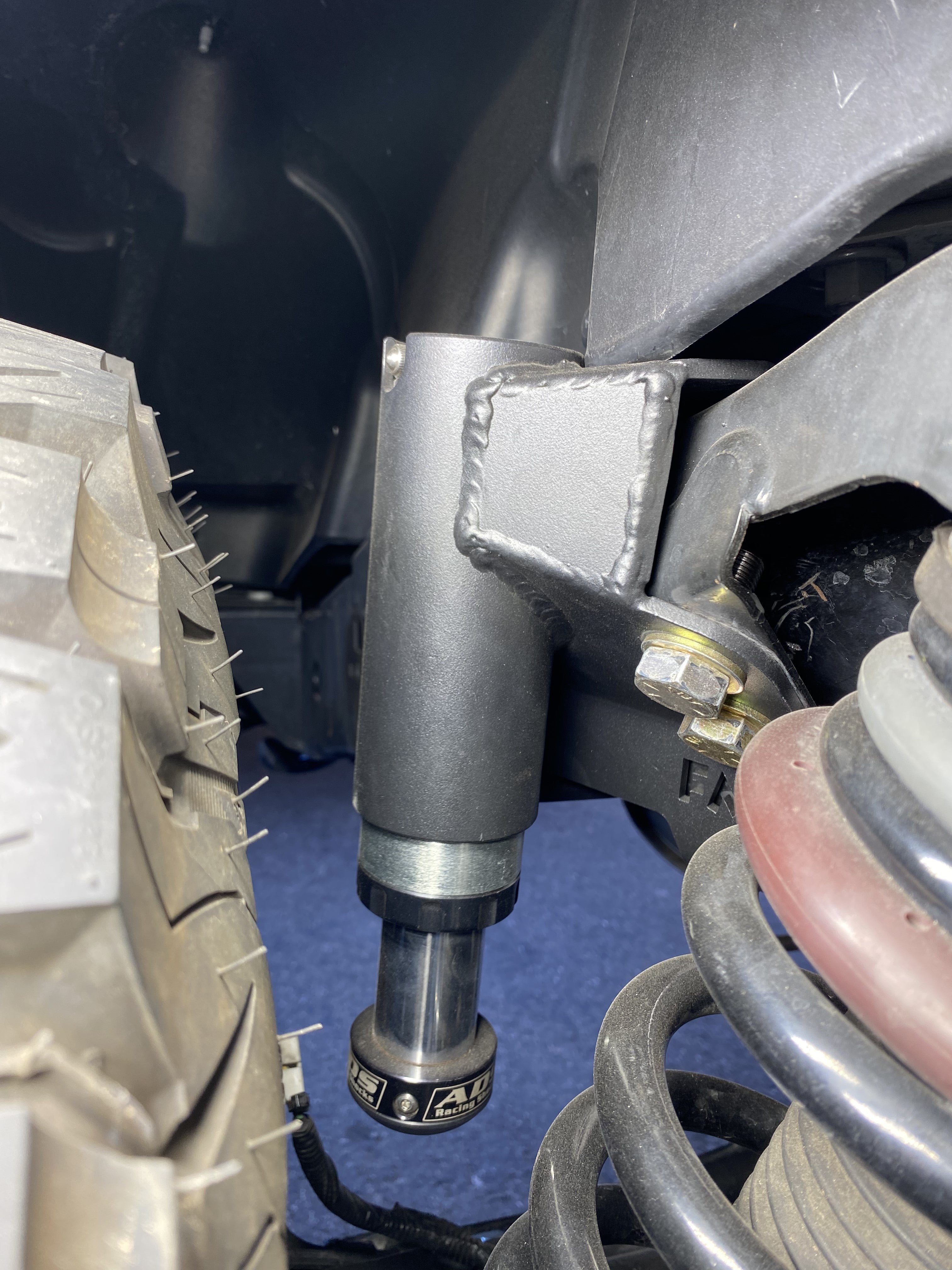 2021 and up Bronco rear hydraulic bump stop kit installed, showcasing durable construction and precise fitment for offroad performance.