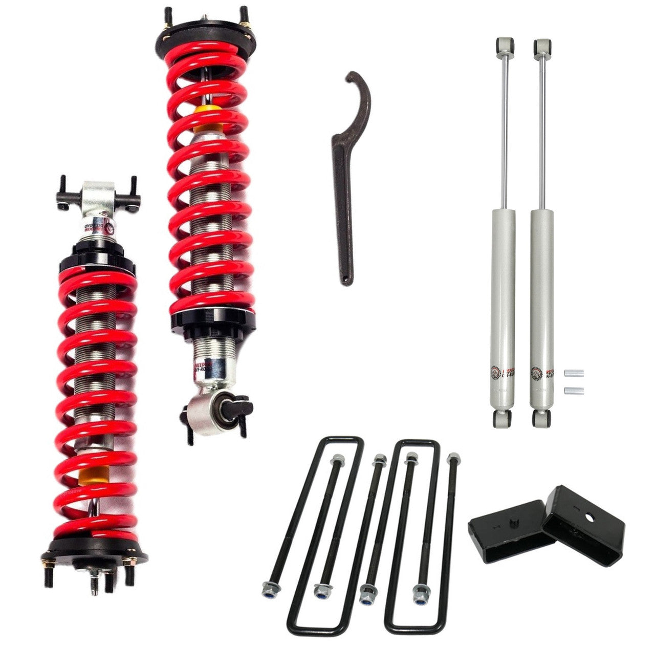 Adjustable coilovers, rear blocks, U bolts, and shocks for 2007-2019 Silverado/Sierra 1500, enhancing off-road performance.