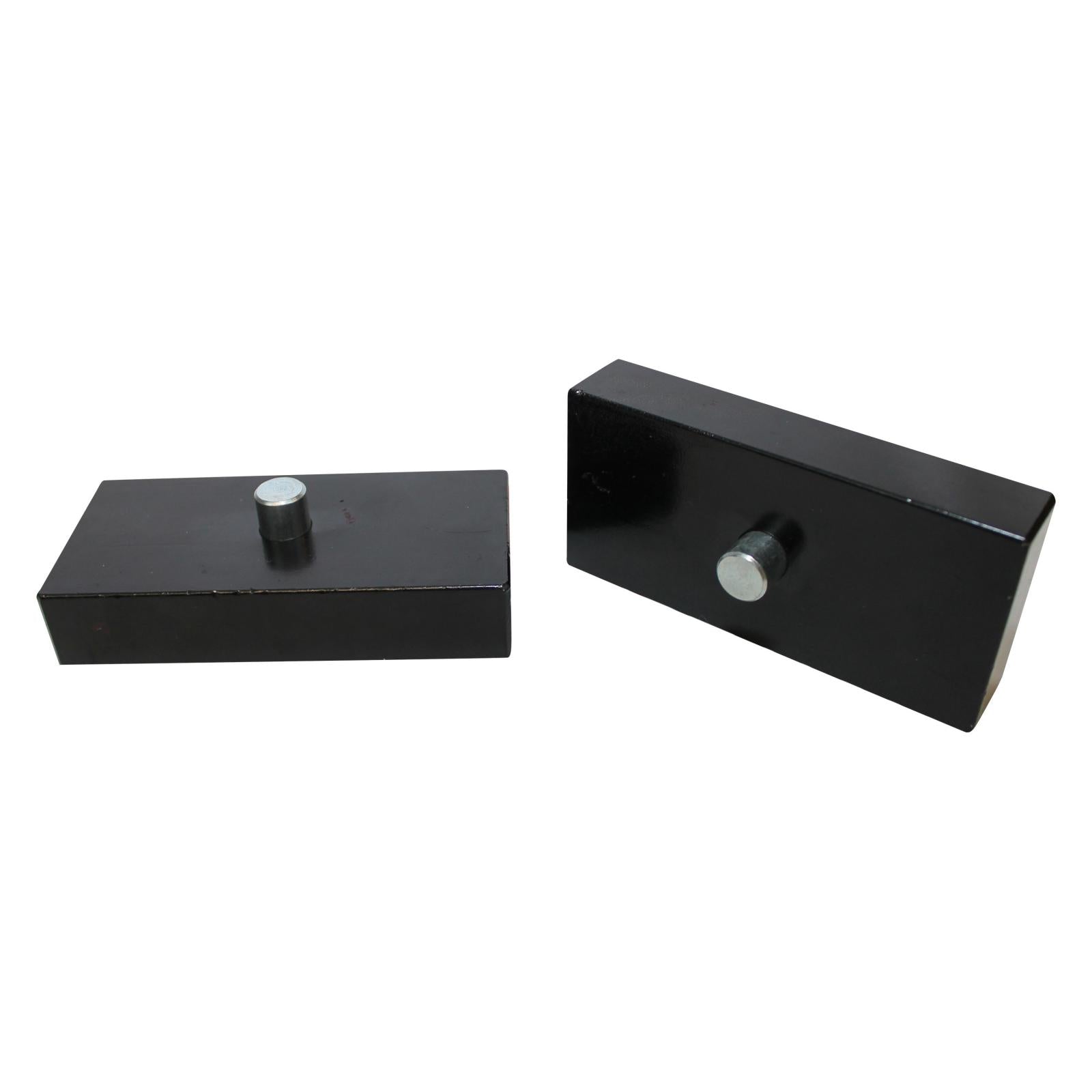 1 inch aluminum rear lift blocks for various truck models, enhancing rear suspension height and stability.