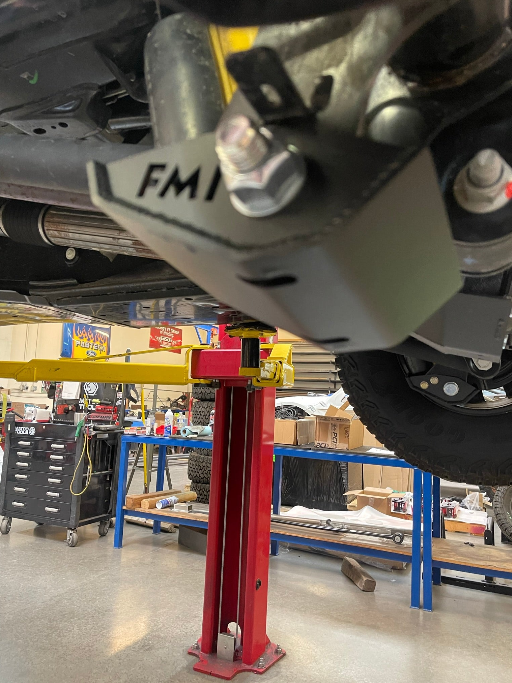 2022 Bronco rear shock skid kit for HOSS 3.0 Shock, showcasing durable construction and installation setup.