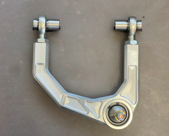Billet aluminum upper arm kit for 2021 and newer Bronco, designed for stock length suspension. Durable and lightweight construction.