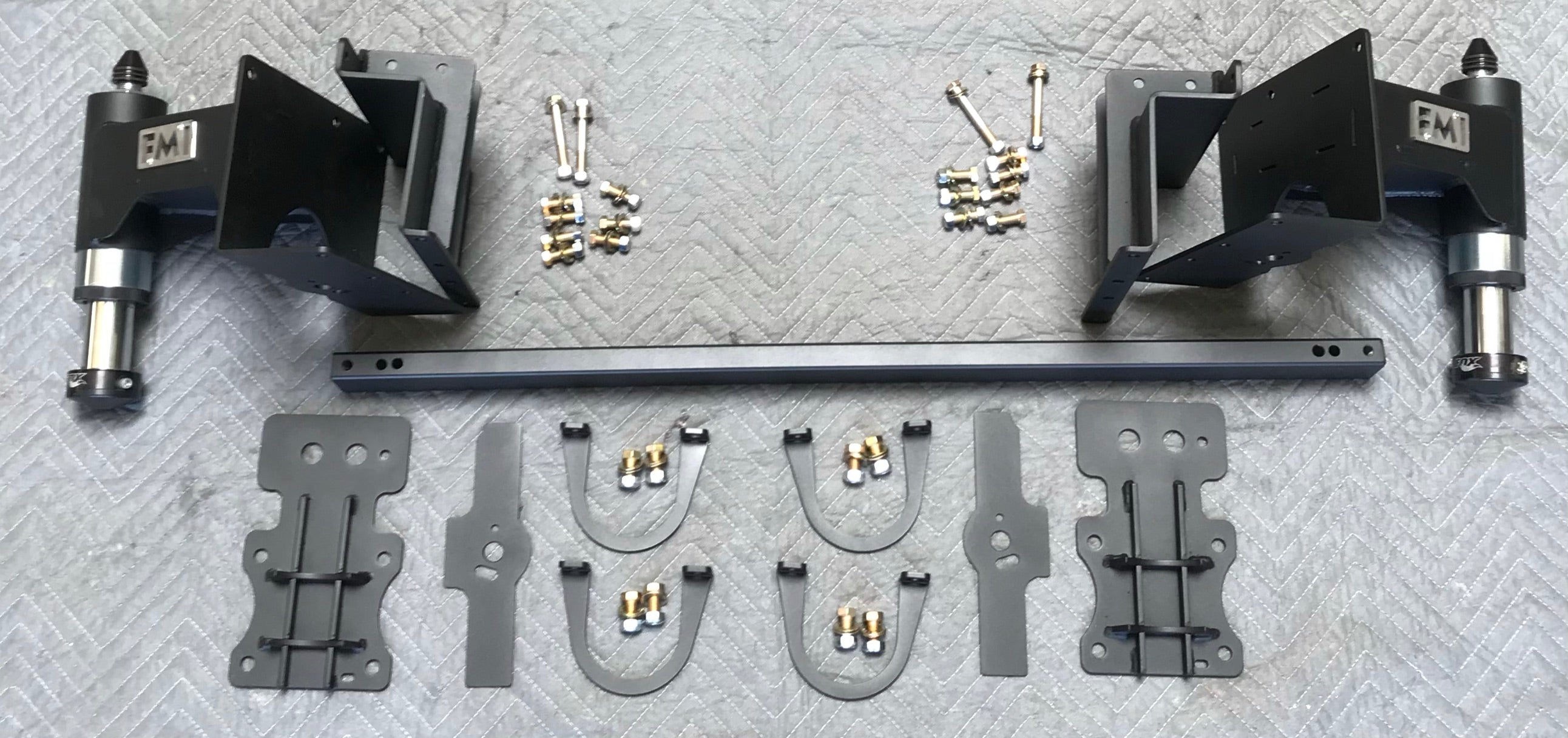 Rear bump stop kit for 2017-2020 Raptor and 2015-2024 F150, featuring mounting brackets and hardware for installation.
