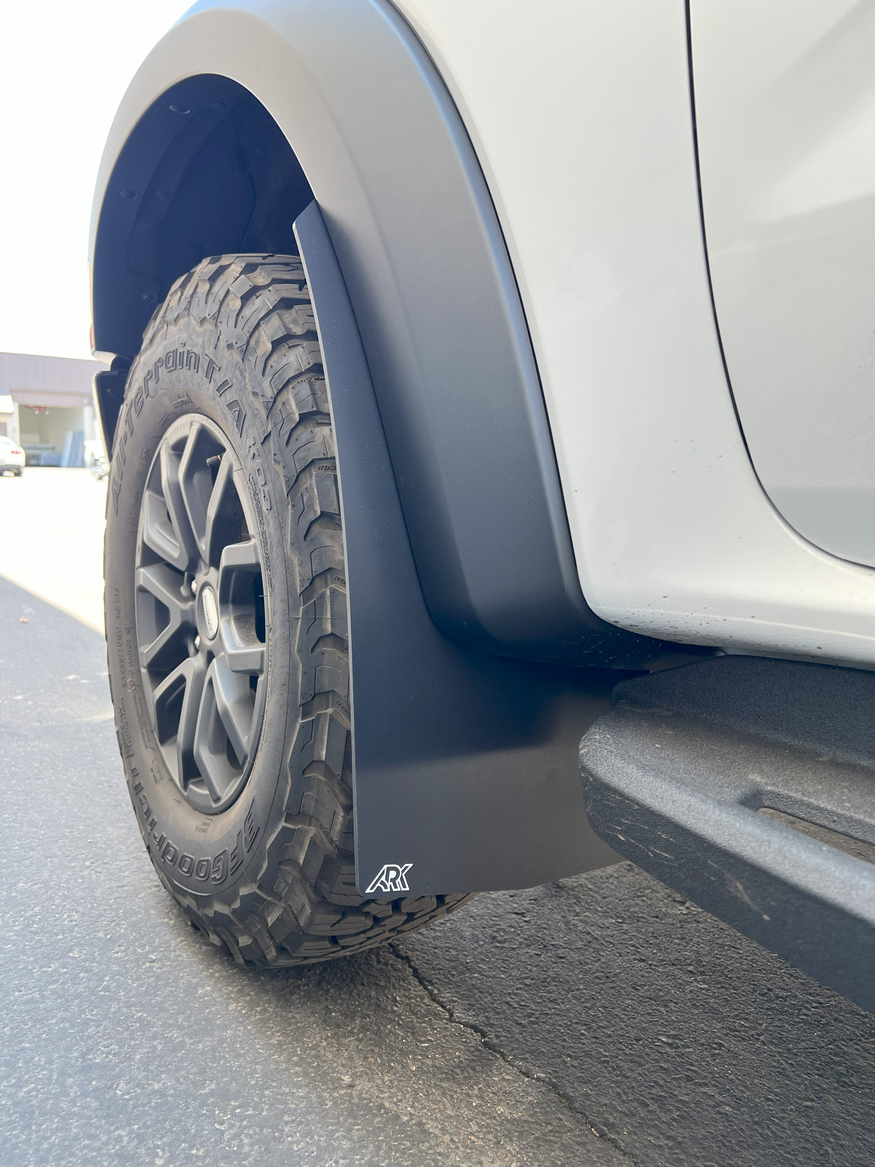2024+ Ford Ranger Raptor TriXPoly Mud Flaps installed on a truck, showcasing rugged design and tire protection.