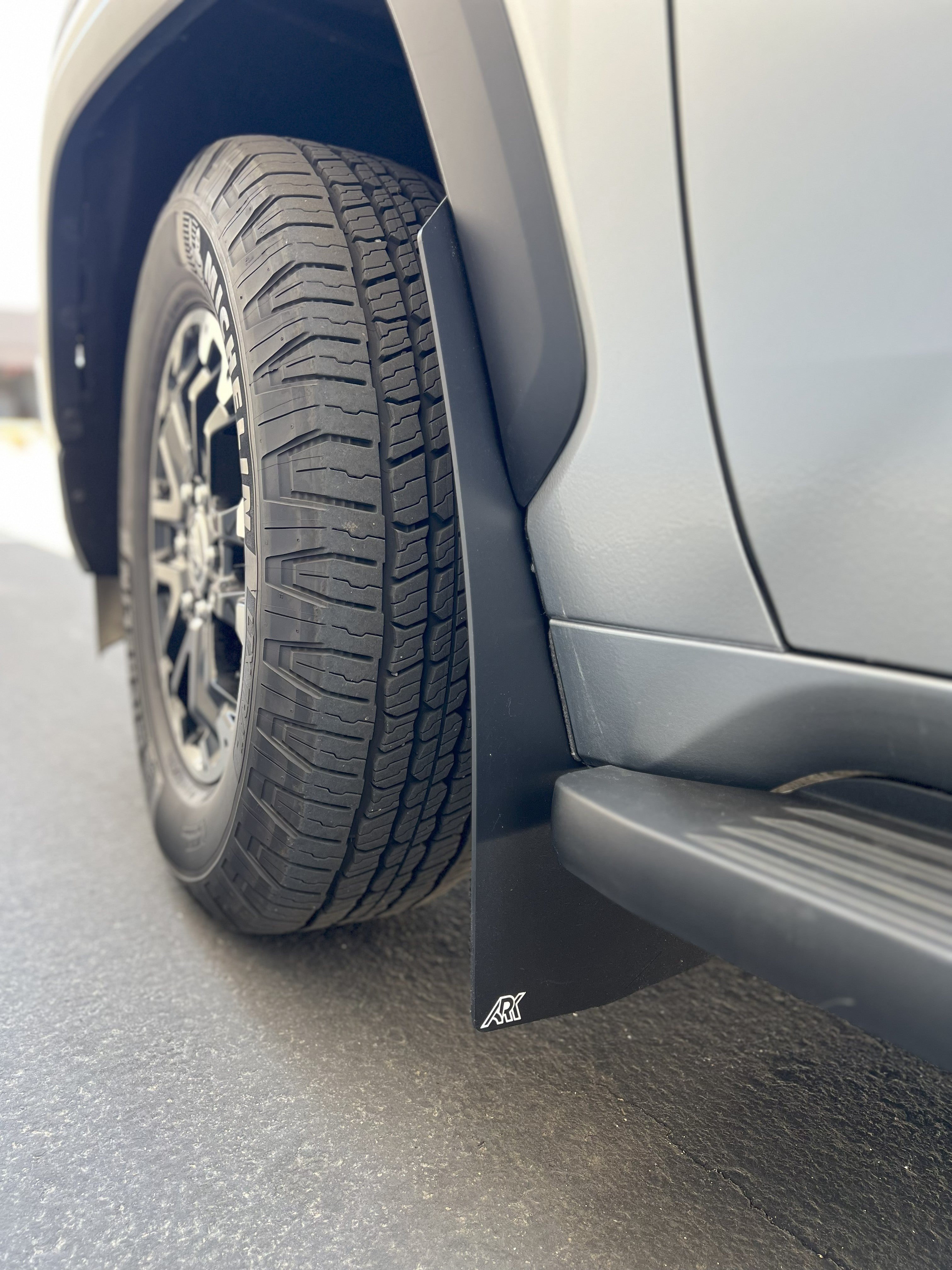 2022+ Toyota Sequoia TriXPoly Mudflaps installed on a vehicle, showcasing tire protection and rugged design.
