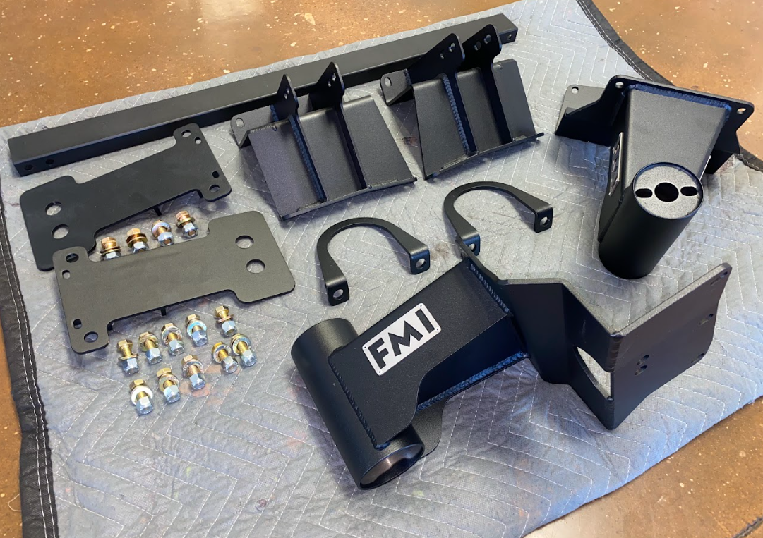 2010-2014 Ford Raptor Bump Stop Kit by Foutz Motorsports featuring various components for enhanced off-road performance.
