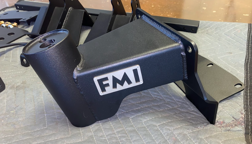 2010-2014 Ford Raptor Bump Stop Kit by Foutz Motorsports featuring a durable black finish and sturdy design for offroad performance.