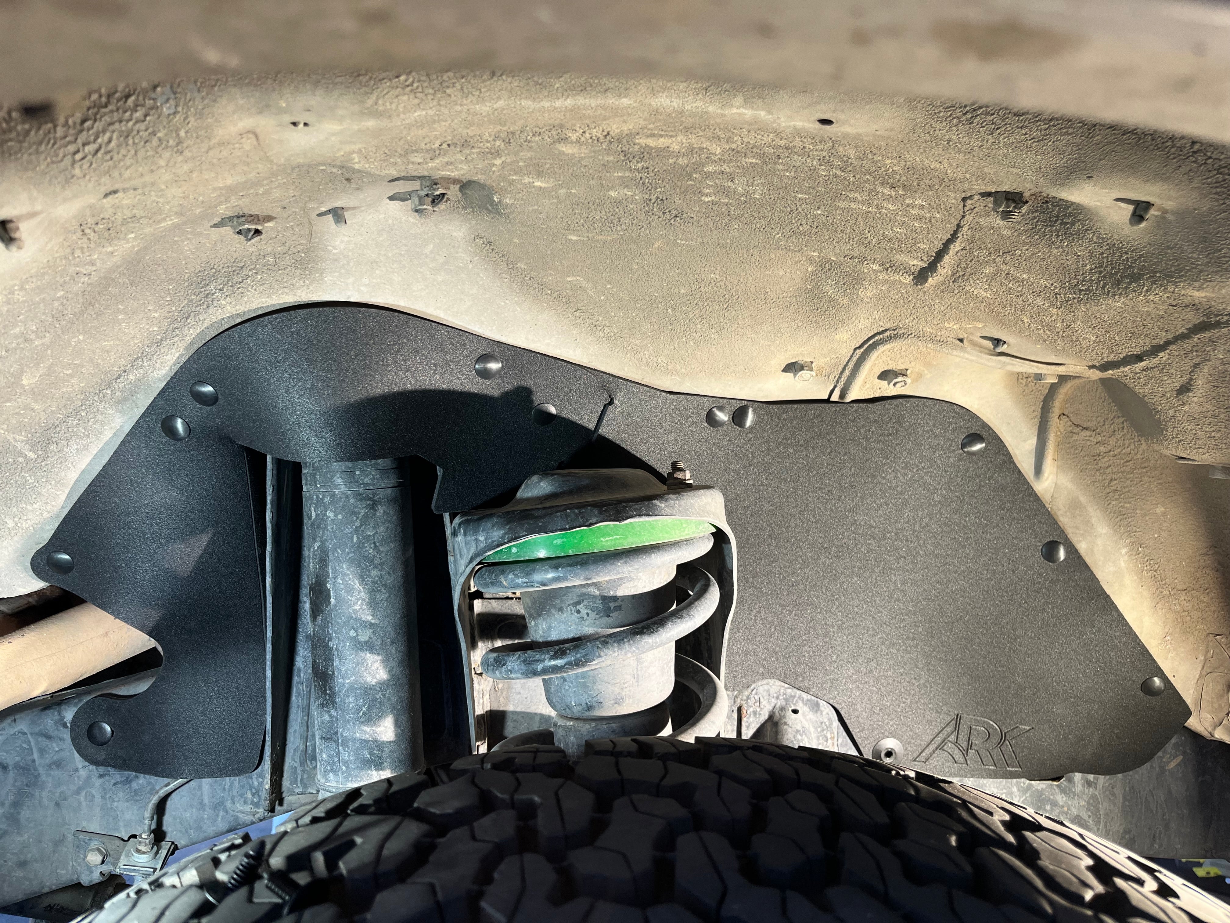 Splash guards for 1993-1997 Toyota Land Cruiser FZJ80, designed to protect undercarriage from debris and mud.