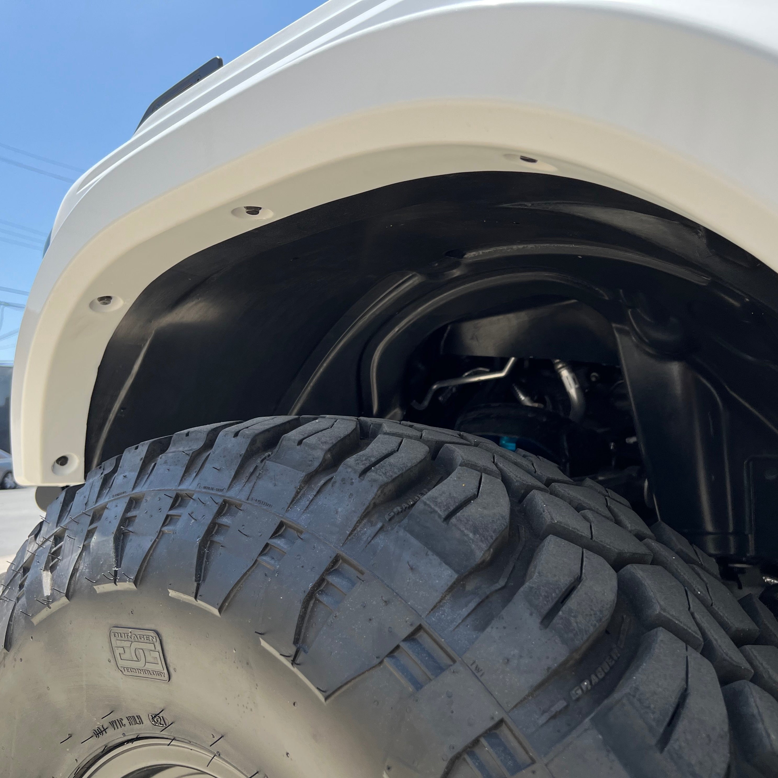 2021-2025 Ford Bronco fender showcasing a close-up view of the inner fender and large off-road tire.