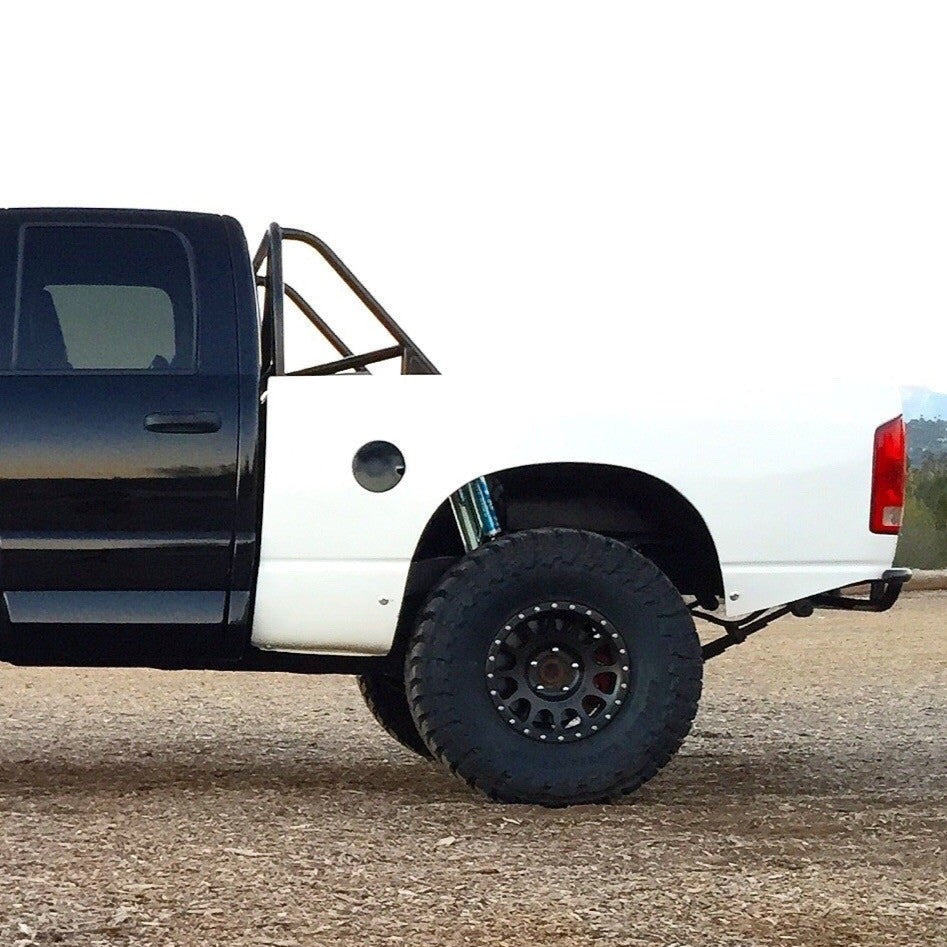 2003-2008 Dodge Ram bedsides on a modified truck showcasing offroad capabilities and rugged design.