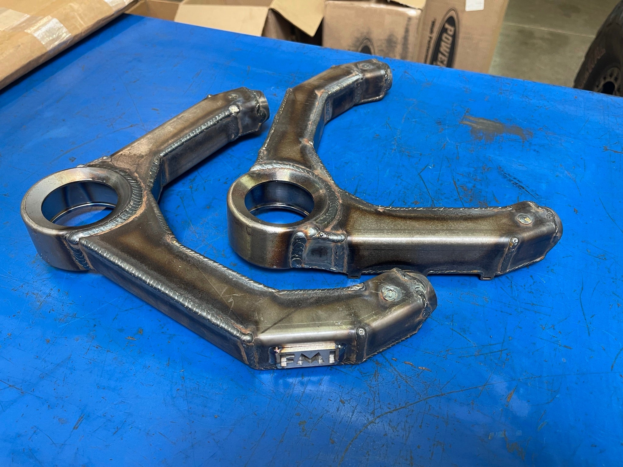 Fabricated upper arm kit for 2017-2018 Gen 2 Raptor, showcasing durable metal construction and precise design.