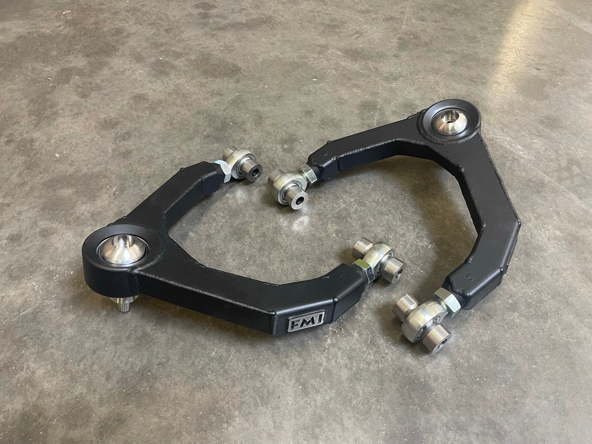 Fabricated upper arm kit for 2019-2024 Gen 3 Raptor, designed for enhanced off-road performance and durability.
