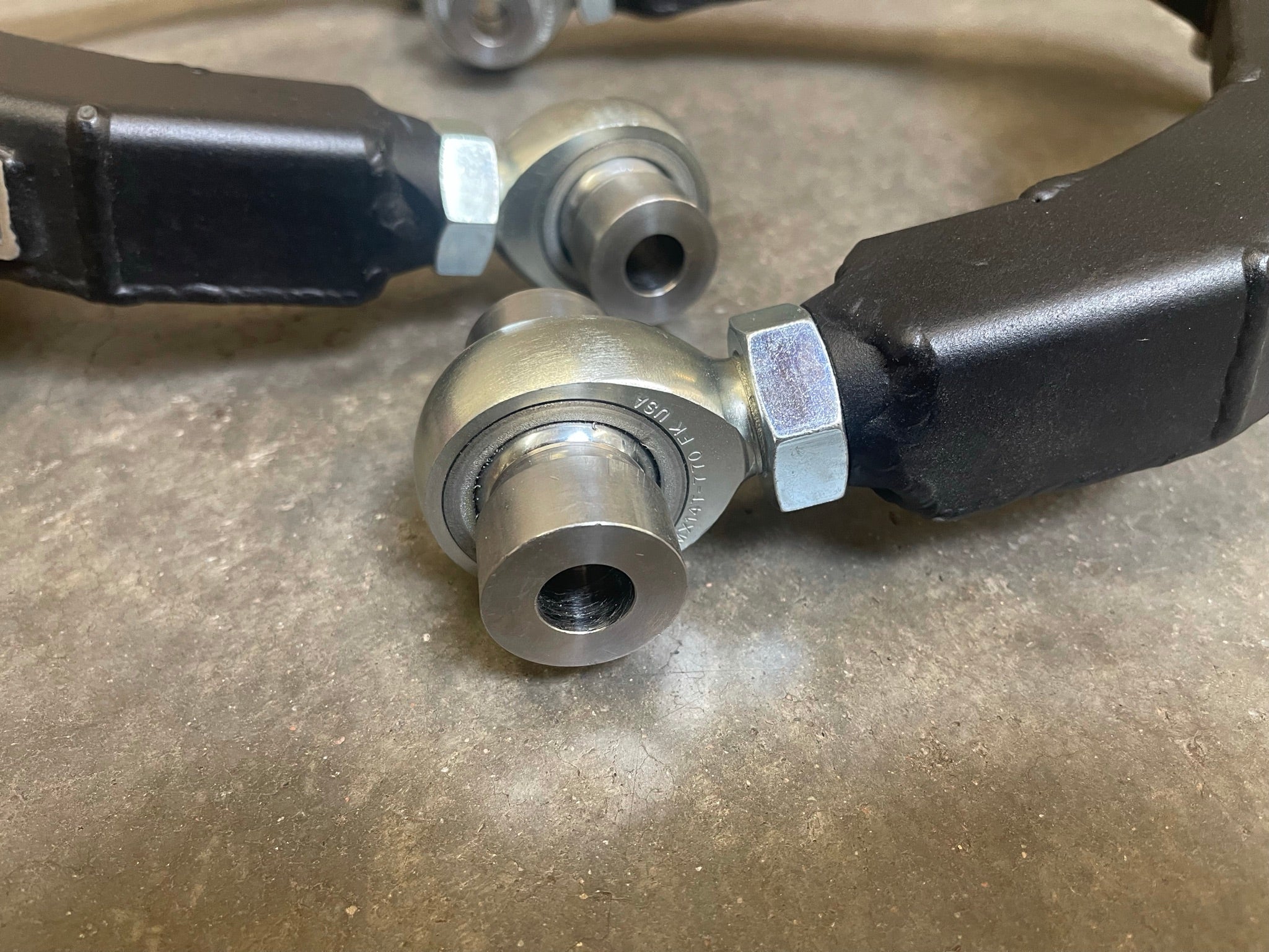 Fabricated upper arm kit for 2017-2018 Gen 2 Raptor featuring high-quality metal joints and durable construction.
