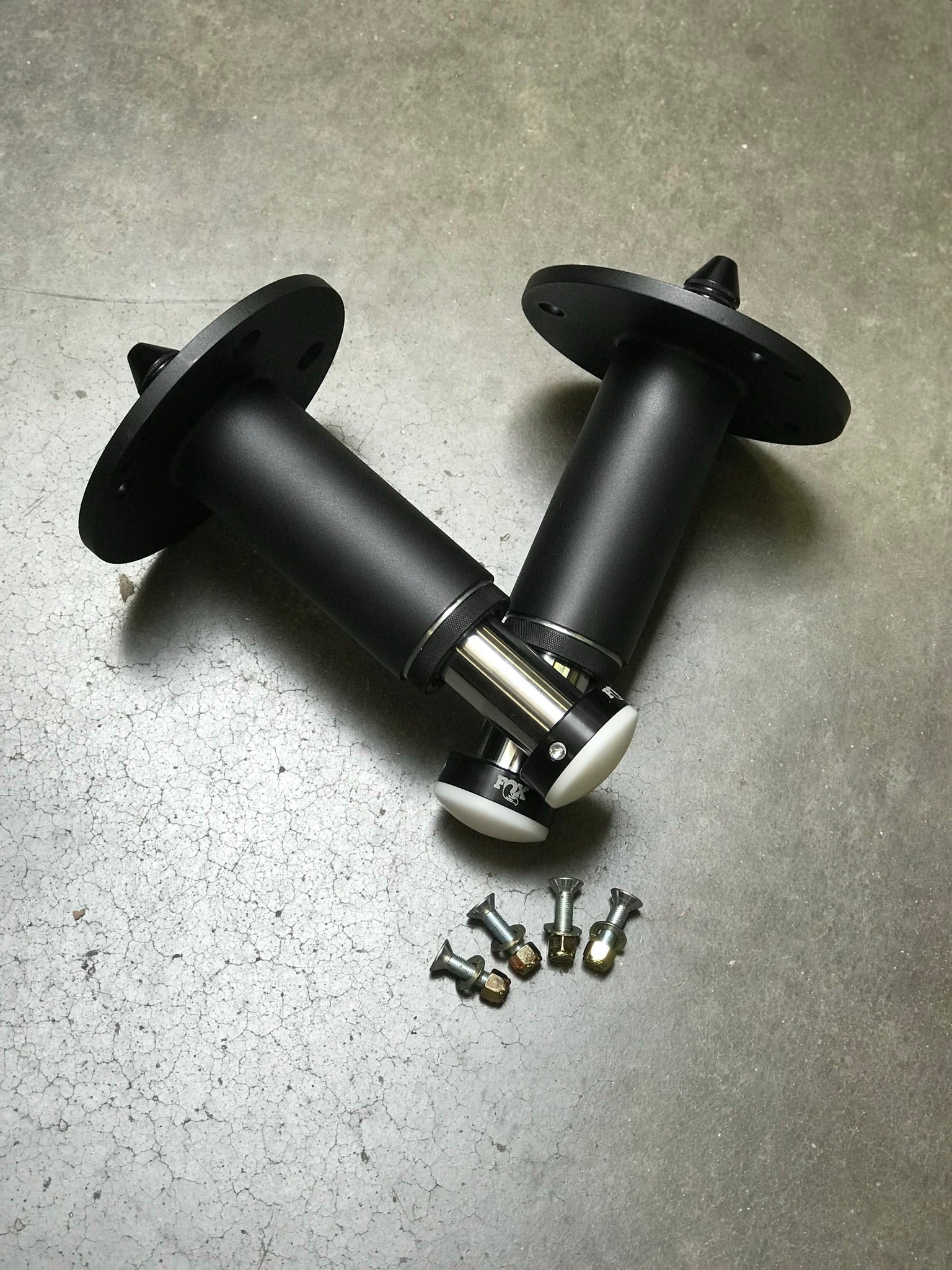 2021 and up Ram TRX rear bump stop kit featuring hydraulic bump stops and installation hardware by Foutz Motorsports.