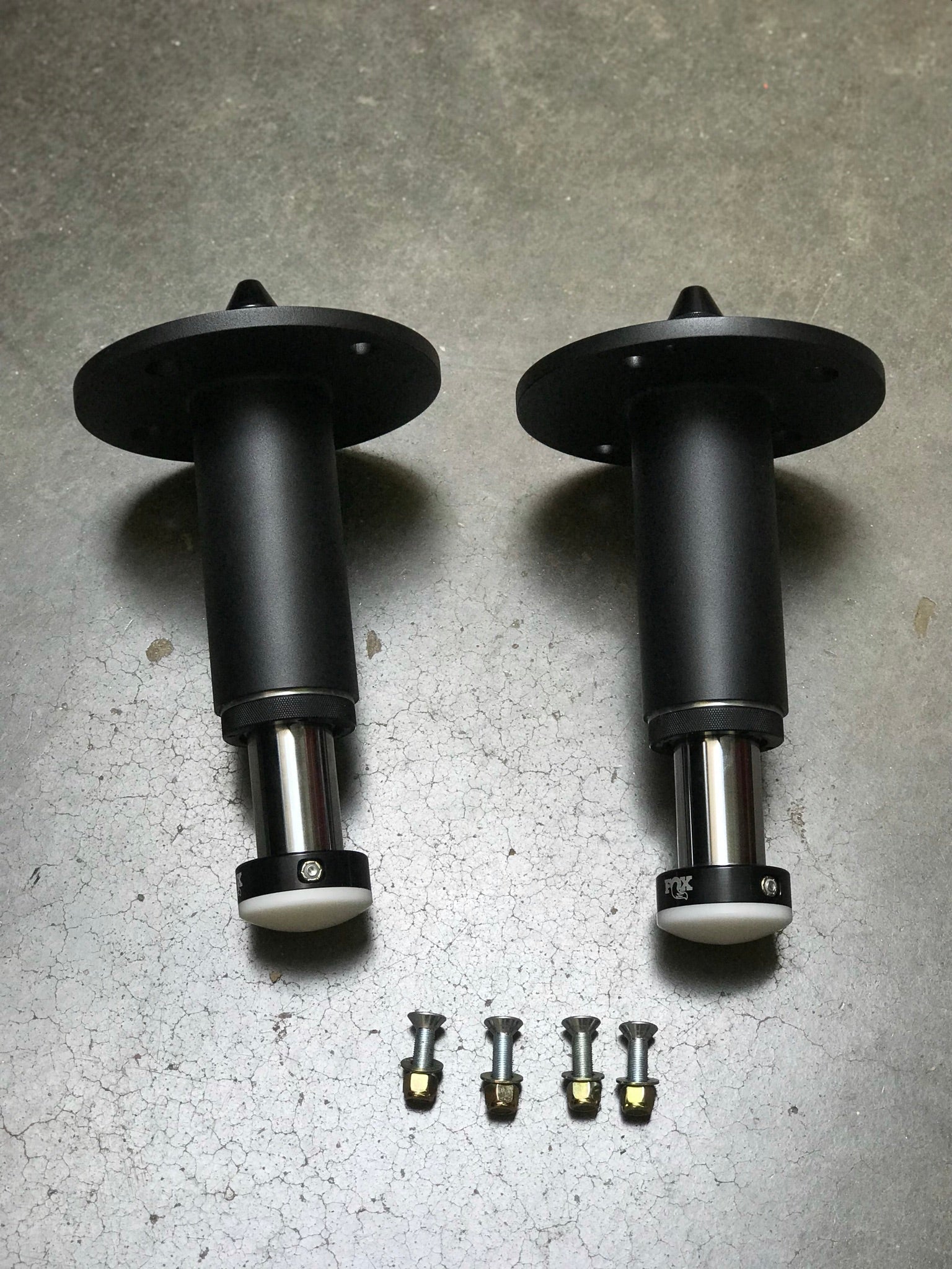 2021 and up Ram TRX rear bump stop kit featuring hydraulic bump stops and installation hardware by Foutz Motorsports.