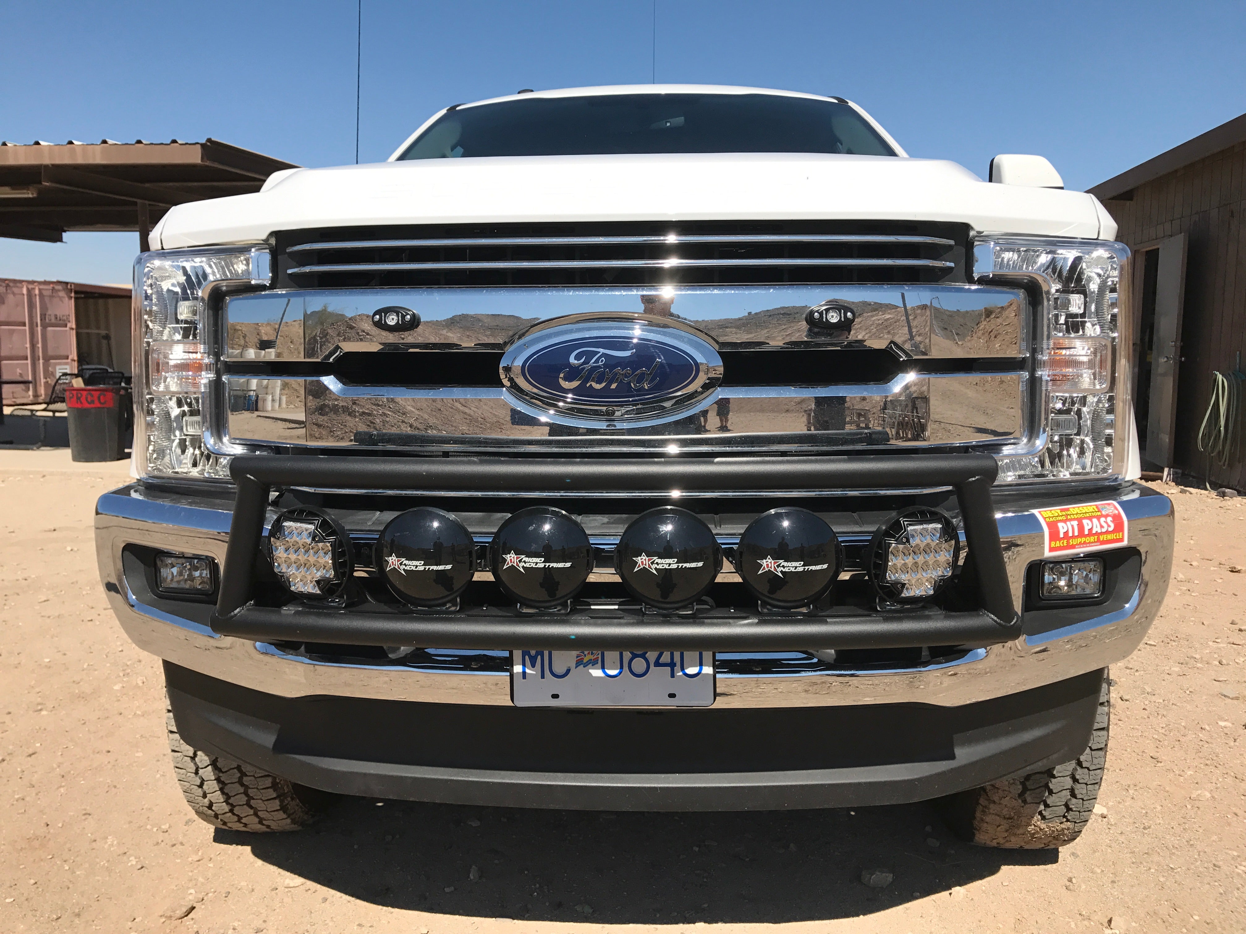 Light mount kit for 2017-2020 Ford Super Duty, designed for stock front bumper, showcasing off-road lights and rugged style.