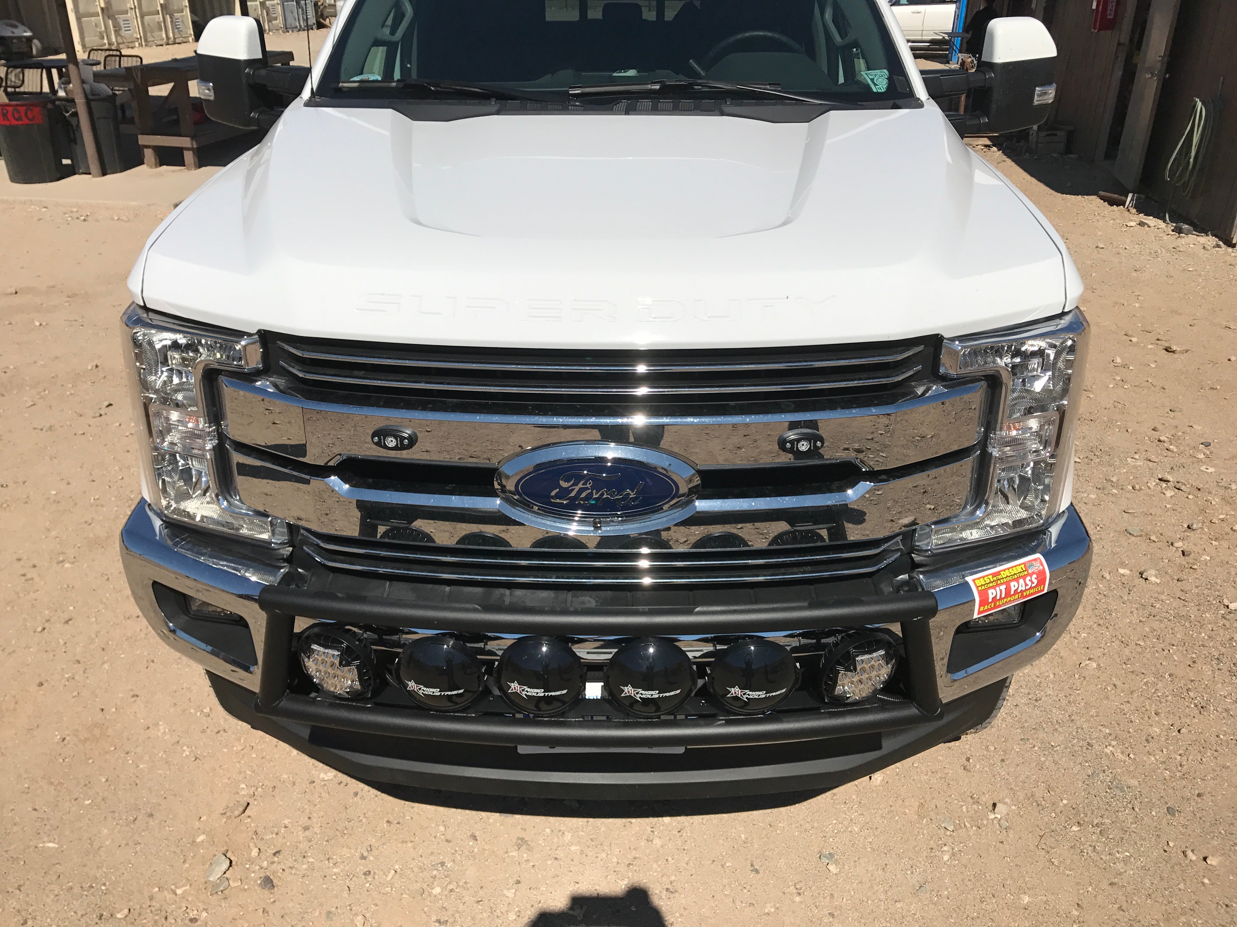 Light mount kit for 2017-2020 Ford Super Duty, designed for stock front bumper, showcasing front view with mounted lights.