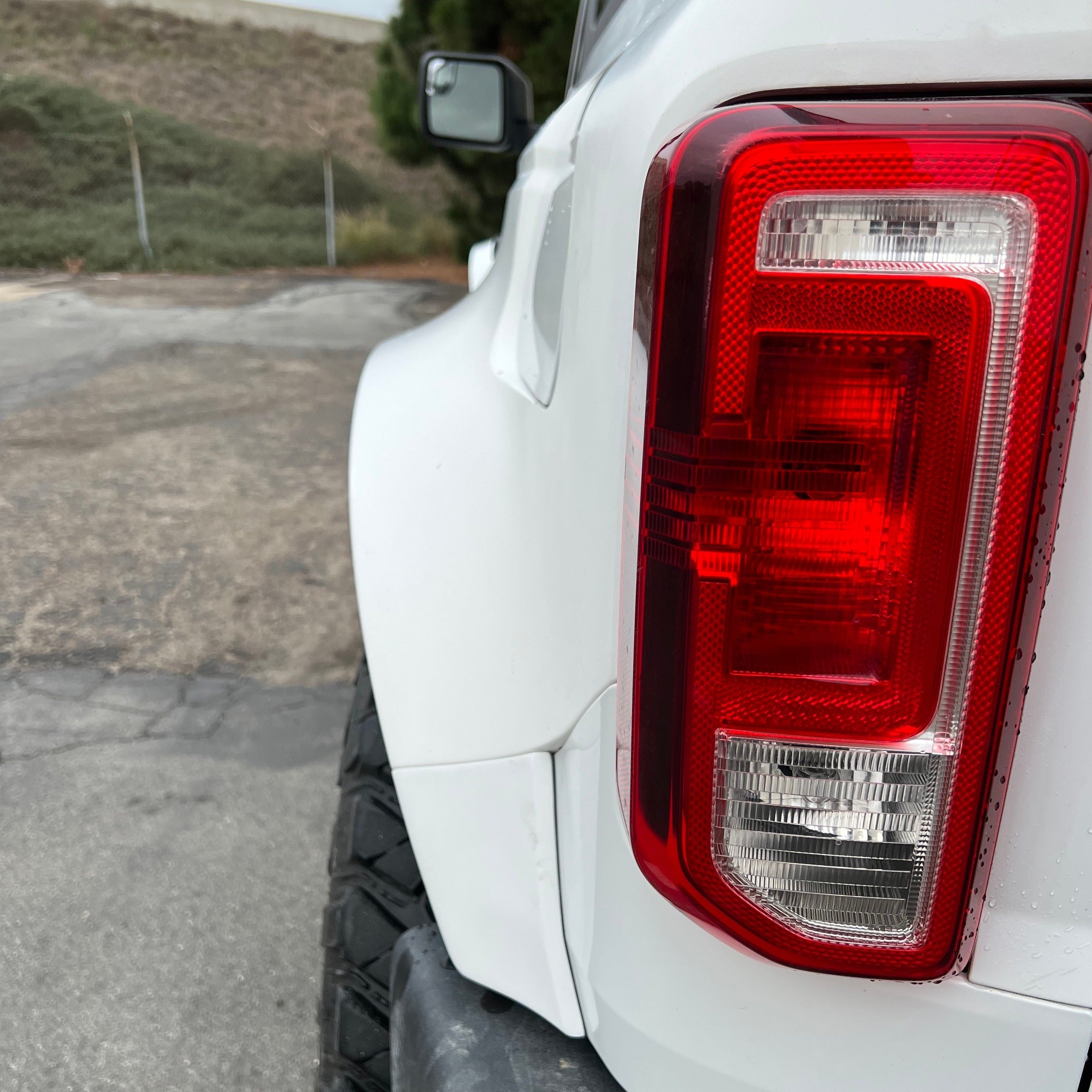 2021-2025 Ford Bronco 2-Door Rear Quarter Kit showcasing the rear fender and taillight on a white vehicle.