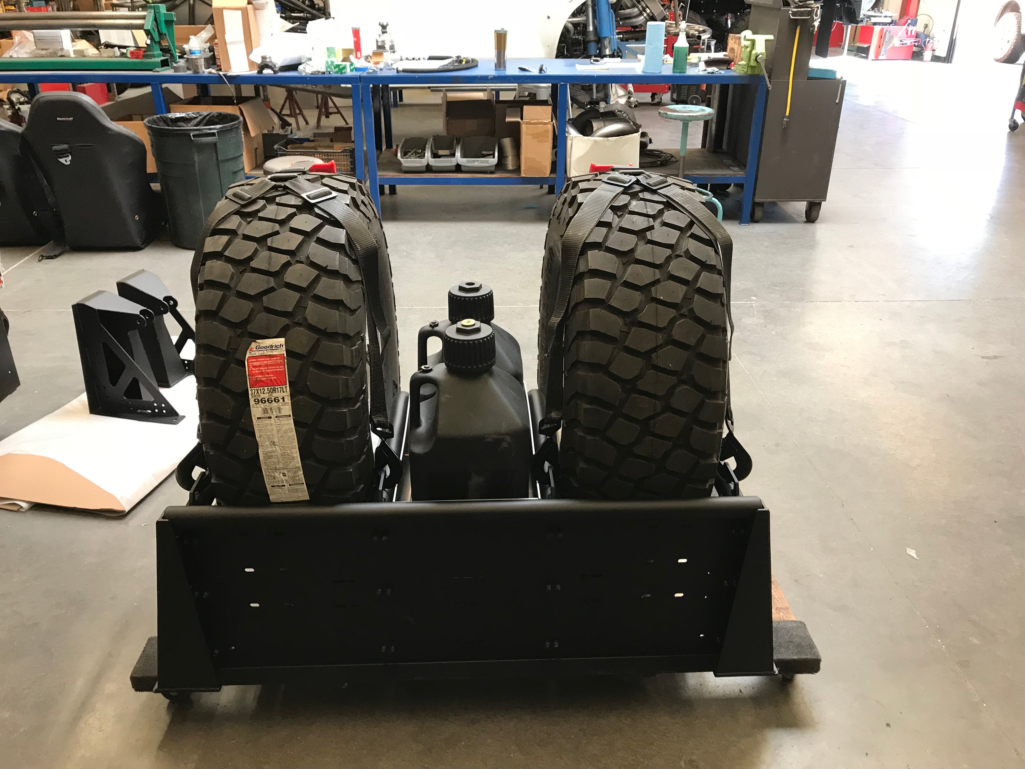 Modular bed organizer for 2017-2024 Ford Raptor and F150, featuring dual tire storage and integrated fuel can holder.