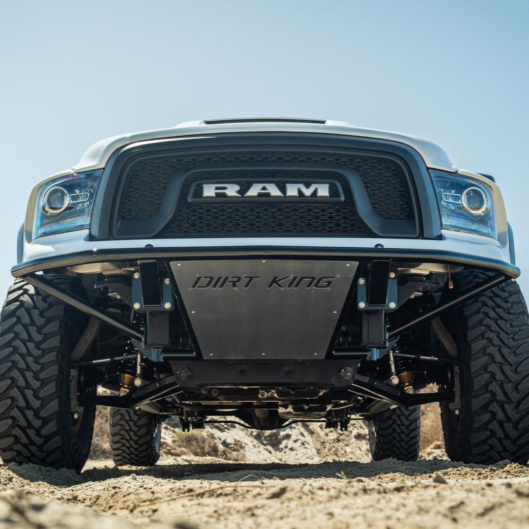 2009-2018 Dodge Ram TRX Kit showcasing a rugged front view with a Dirt King skid plate and offroad tires.