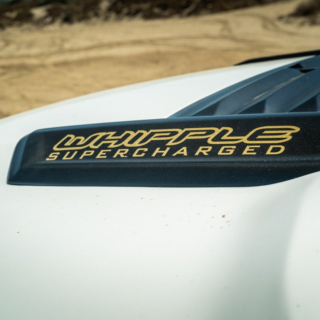 Whipple supercharger badge on a 2009-2018 Dodge Ram TRX, showcasing performance enhancement features.