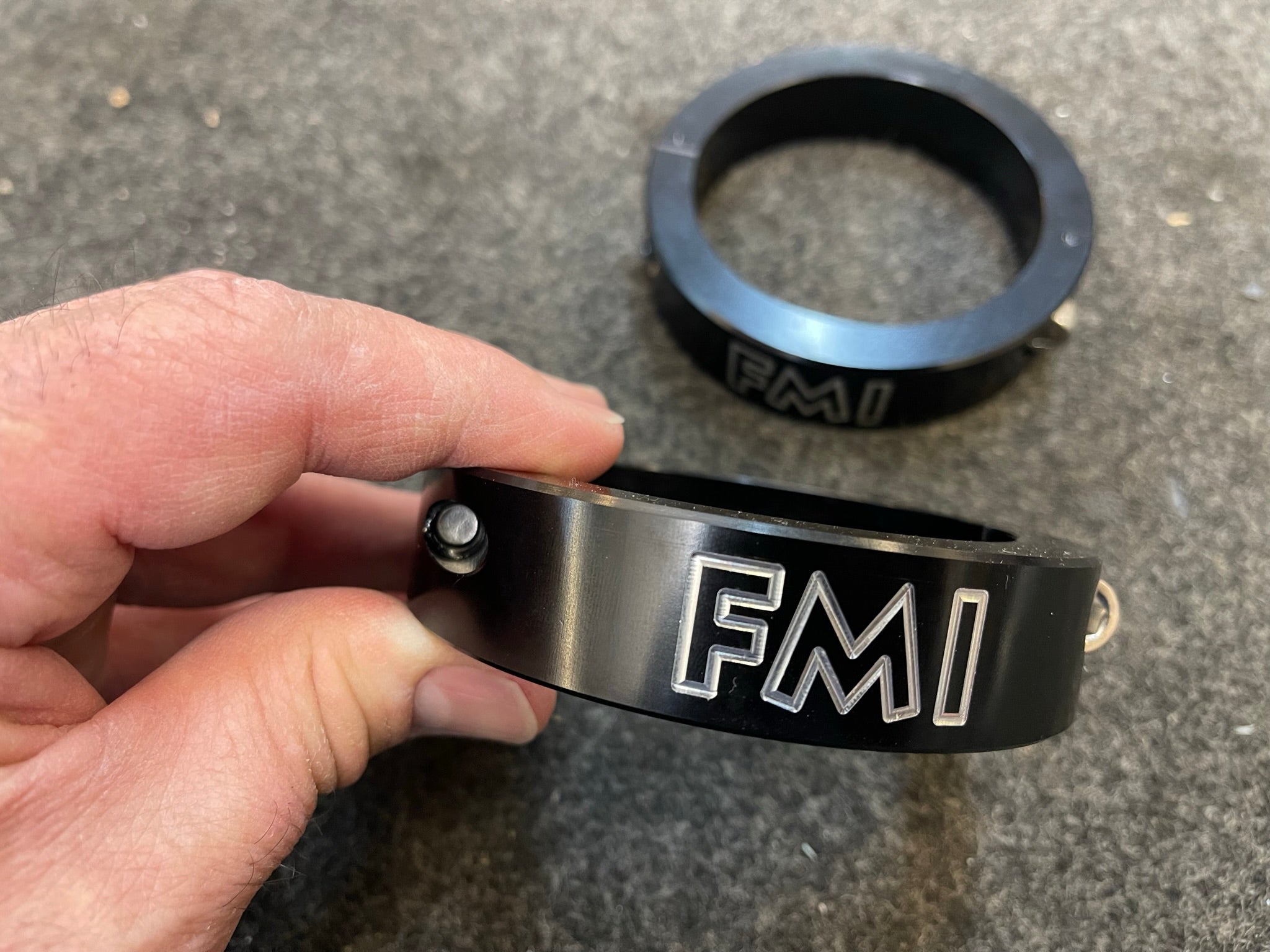 Front leveling kit for 2022 and newer Bronco Raptor, featuring durable construction and FMI branding for enhanced performance.