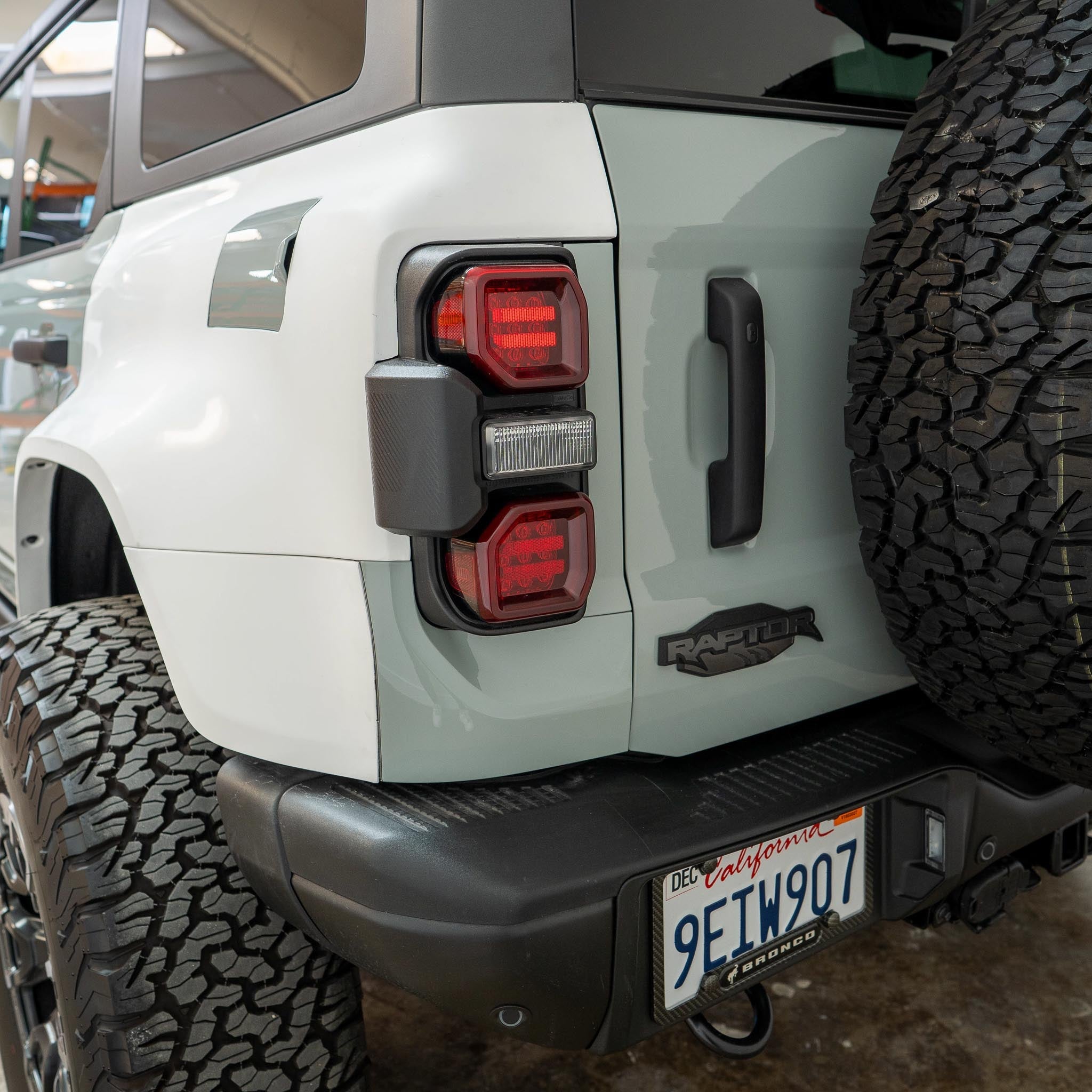 2022-2025 Ford Bronco Raptor rear quarter kit showcasing taillights and rugged design elements for enhanced offroad performance.