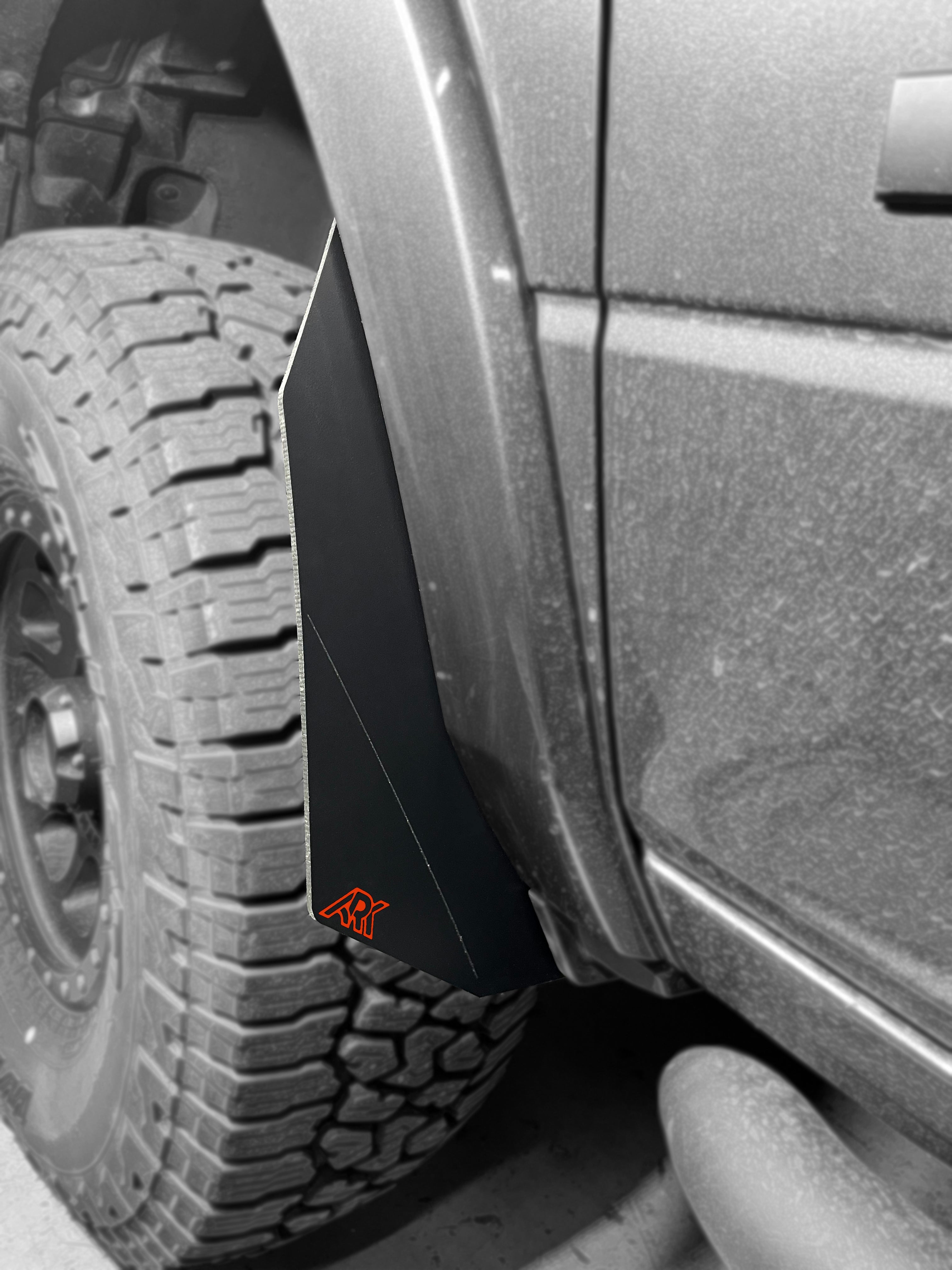 Dodge RAM TriXpoly Micro Splash Guards installed on a truck, providing protection against mud and debris.