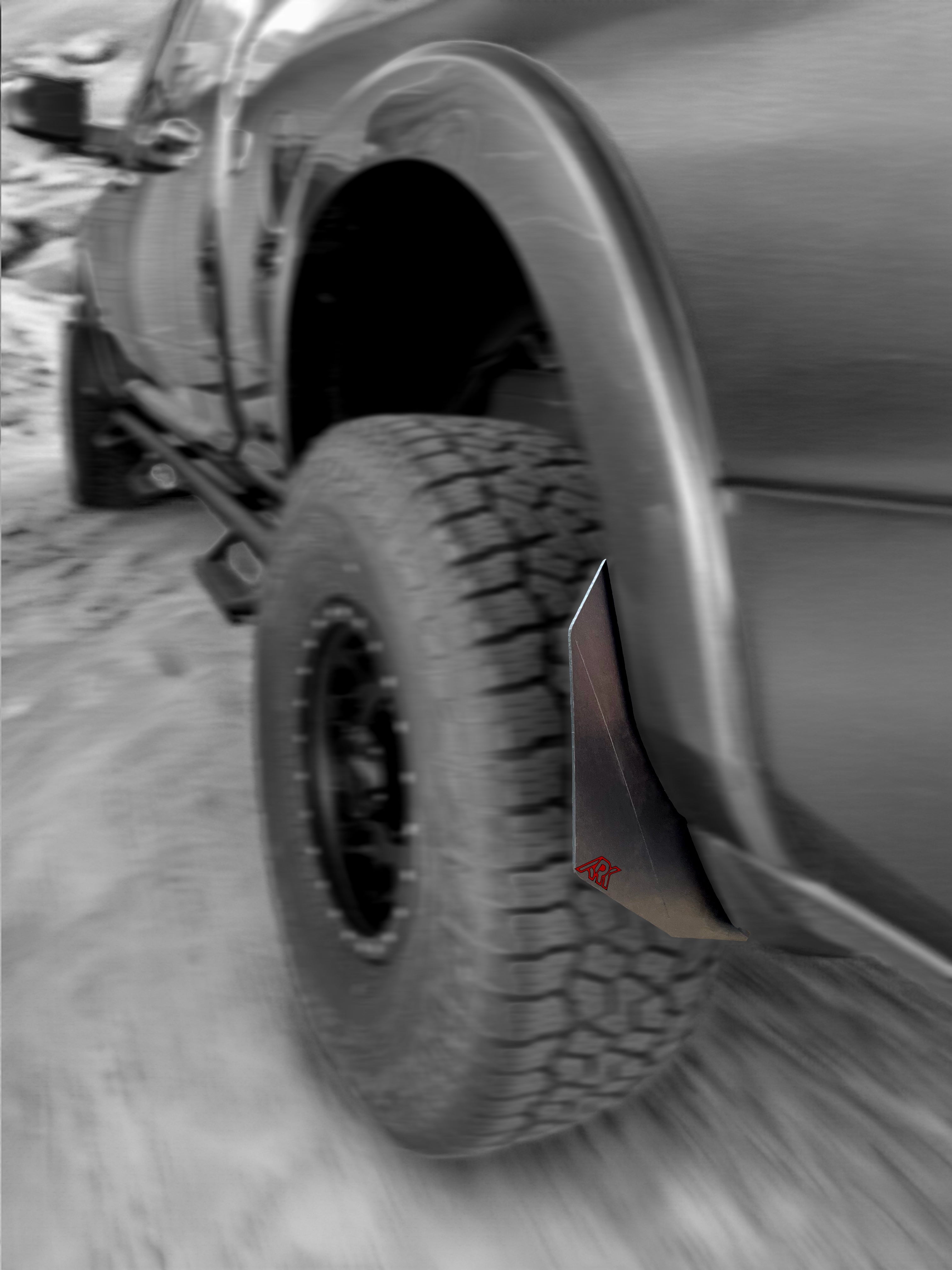 Dodge RAM TriXpoly Micro Splash Guards installed on a truck, enhancing protection against mud and debris.