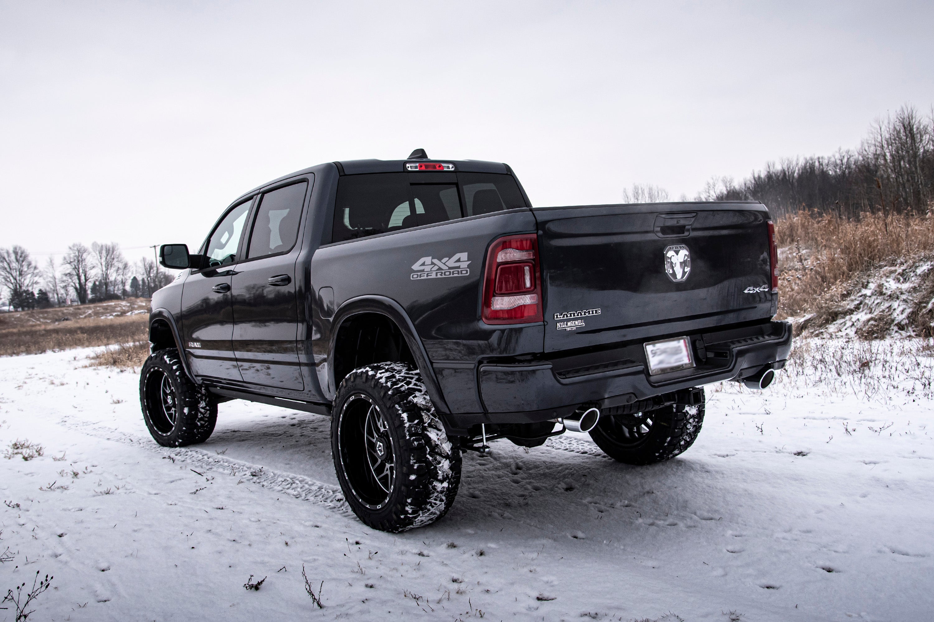 6-inch lift kit for Ram 1500 (2019-2024) 4WD showcased on a lifted truck in a snowy landscape.