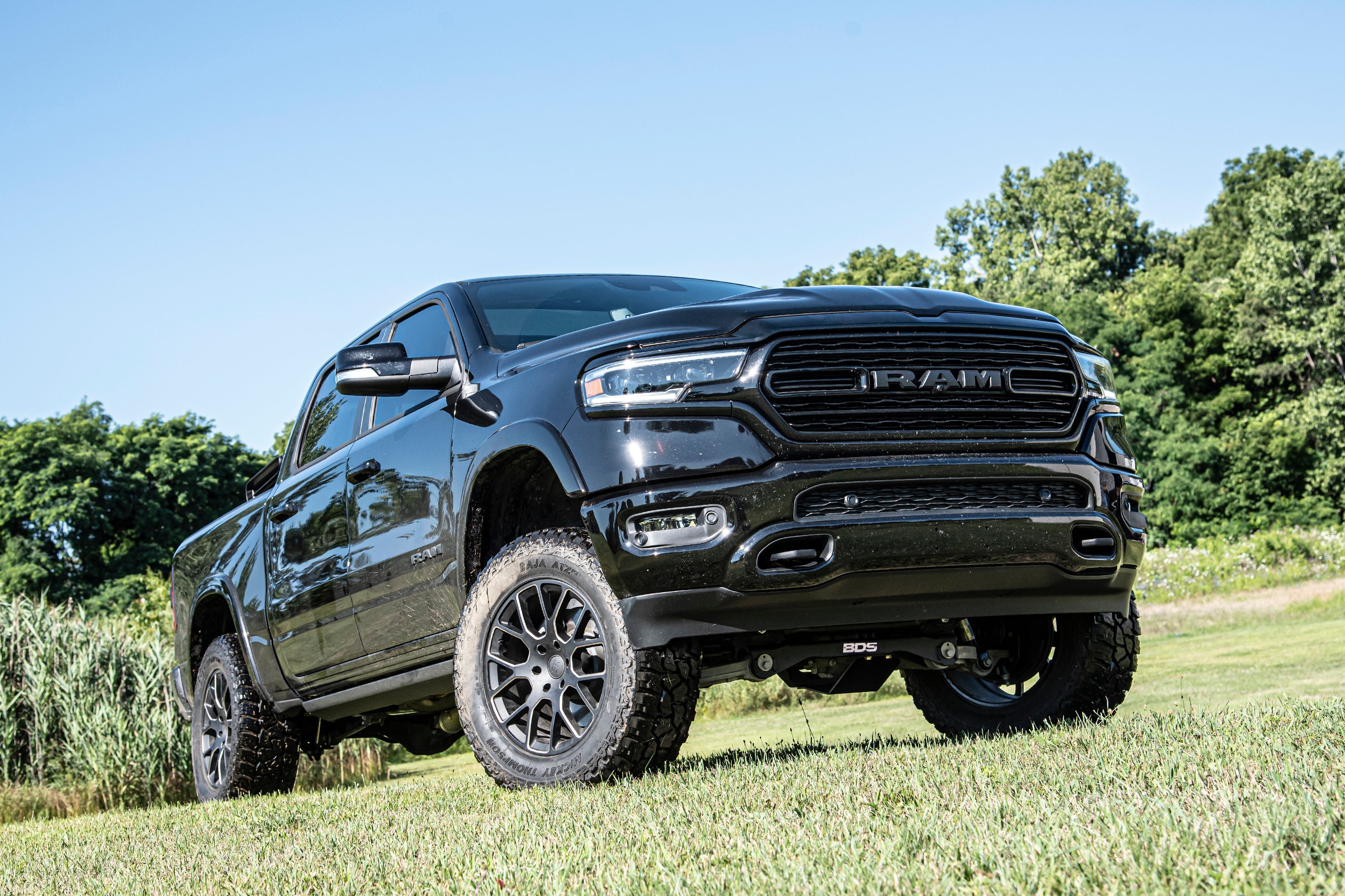 4-inch lift kit for 2019-2024 Ram 1500 with air ride, enhancing off-road capability and aggressive stance.