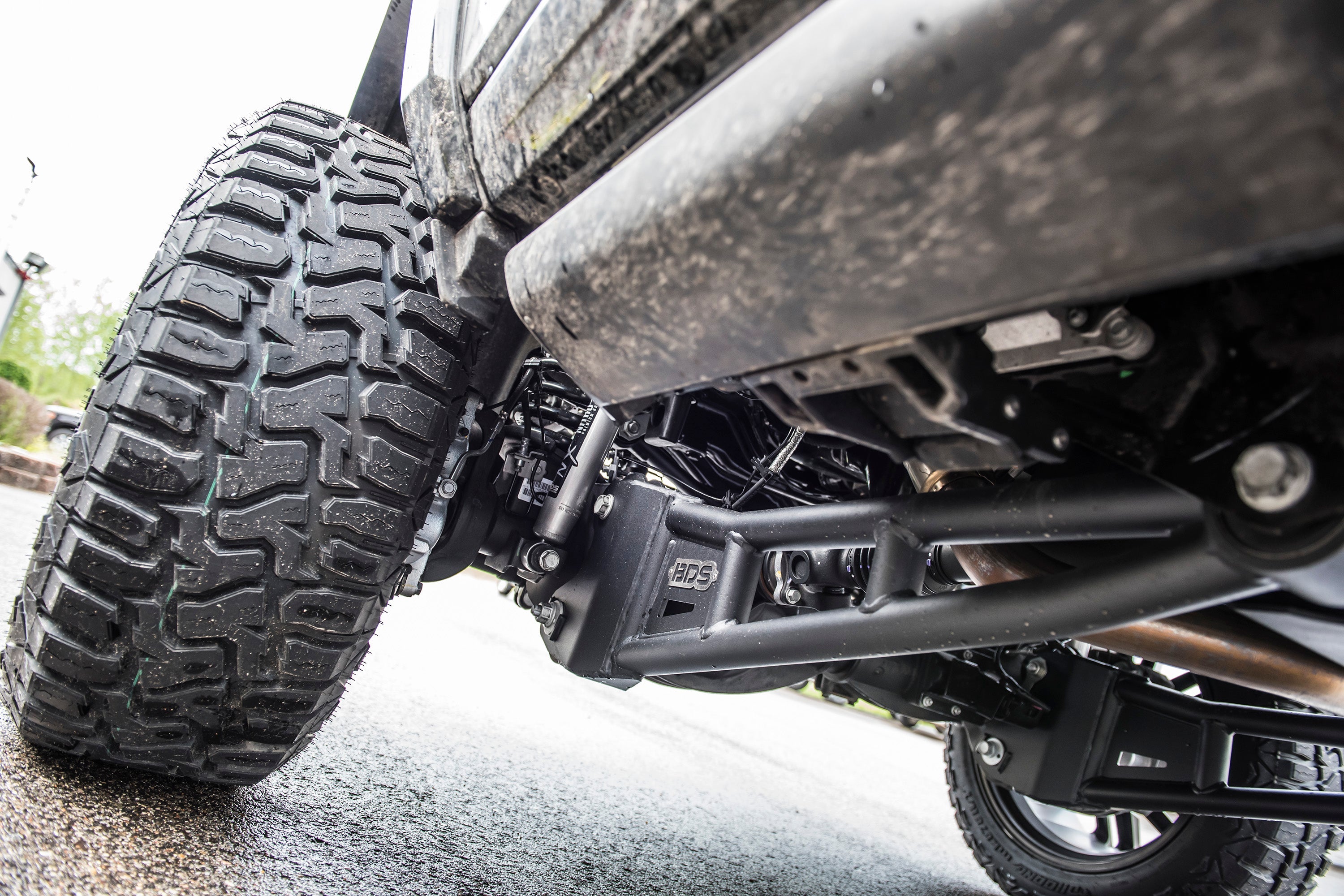 3 inch lift kit with radius arm installed on a Ram 2500 4WD diesel, showcasing enhanced suspension and rugged tires.