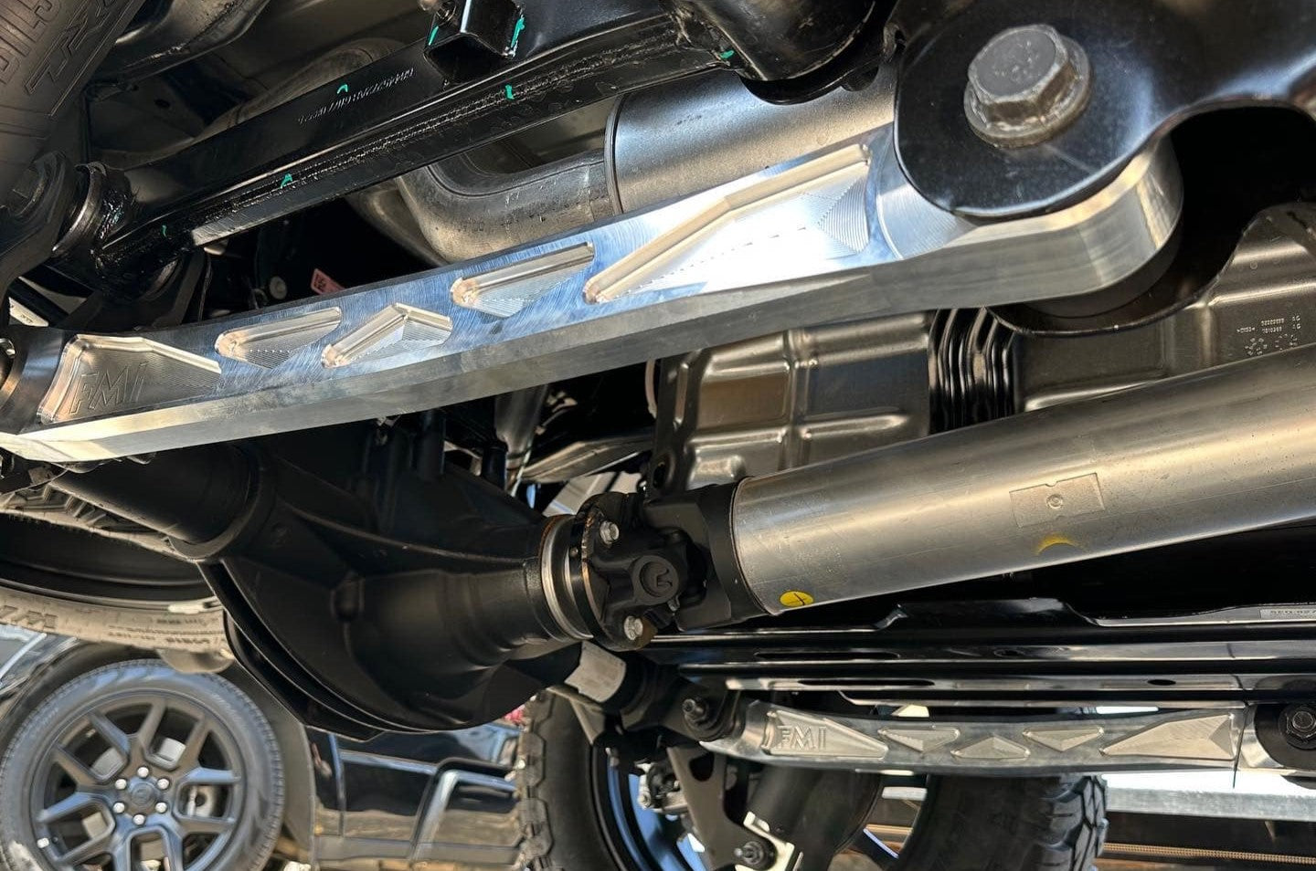 2025 Ram RHO rear lower suspension arms made of billet aluminum, showcasing durability and performance enhancement.