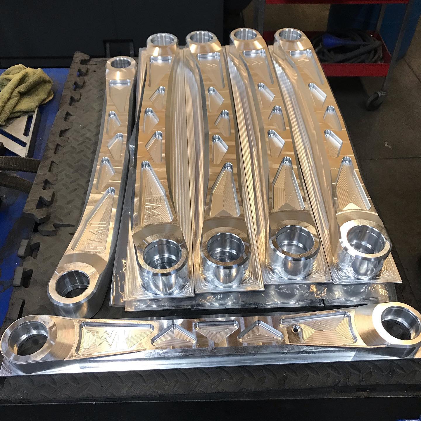 Billet aluminum rear suspension arm kit for 2025 Ram RHO, featuring precision machining and durable design.