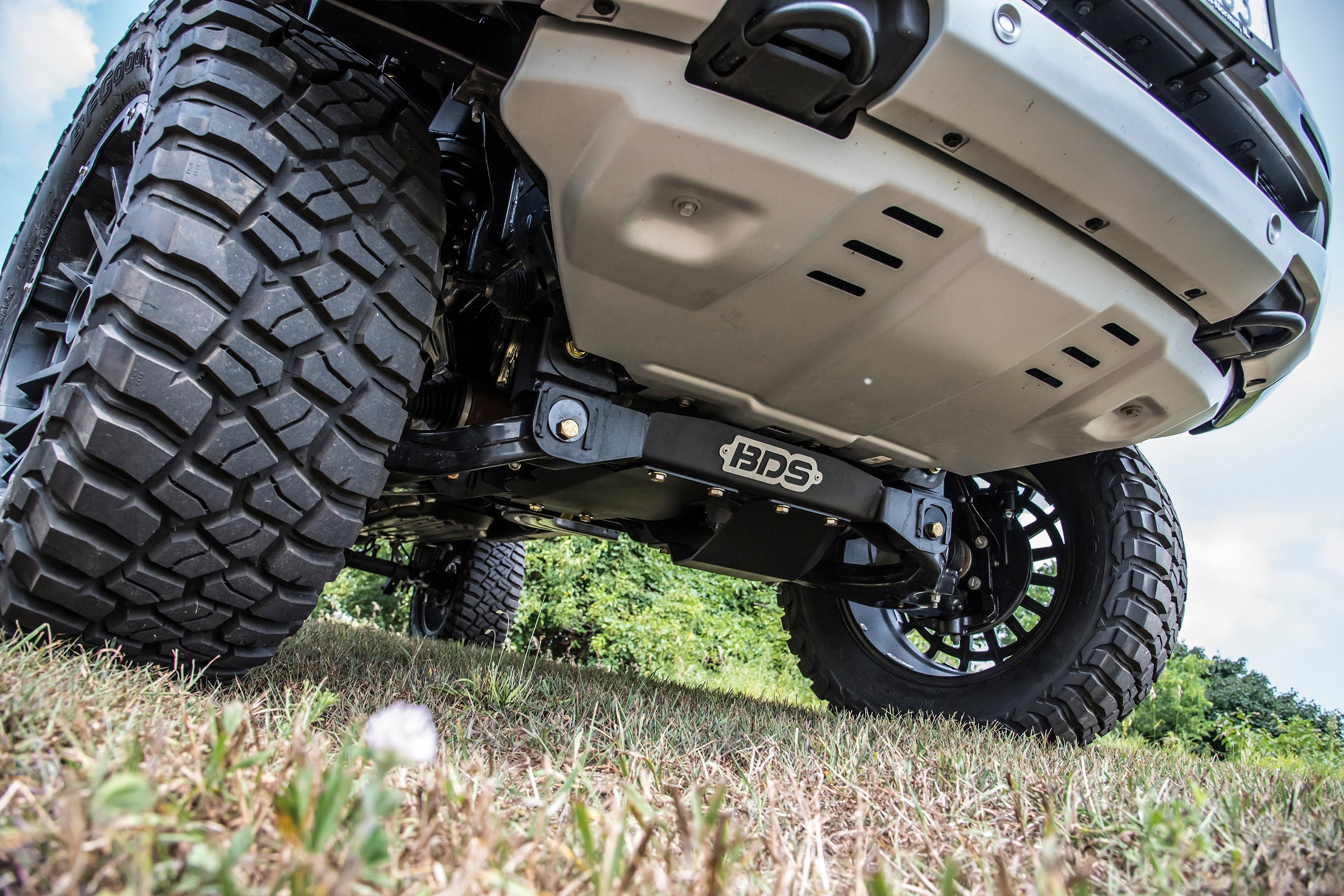 6 inch lift kit with FOX 2.5 coil-over installed on a Ford Ranger 4WD, showcasing rugged tires and undercarriage details.