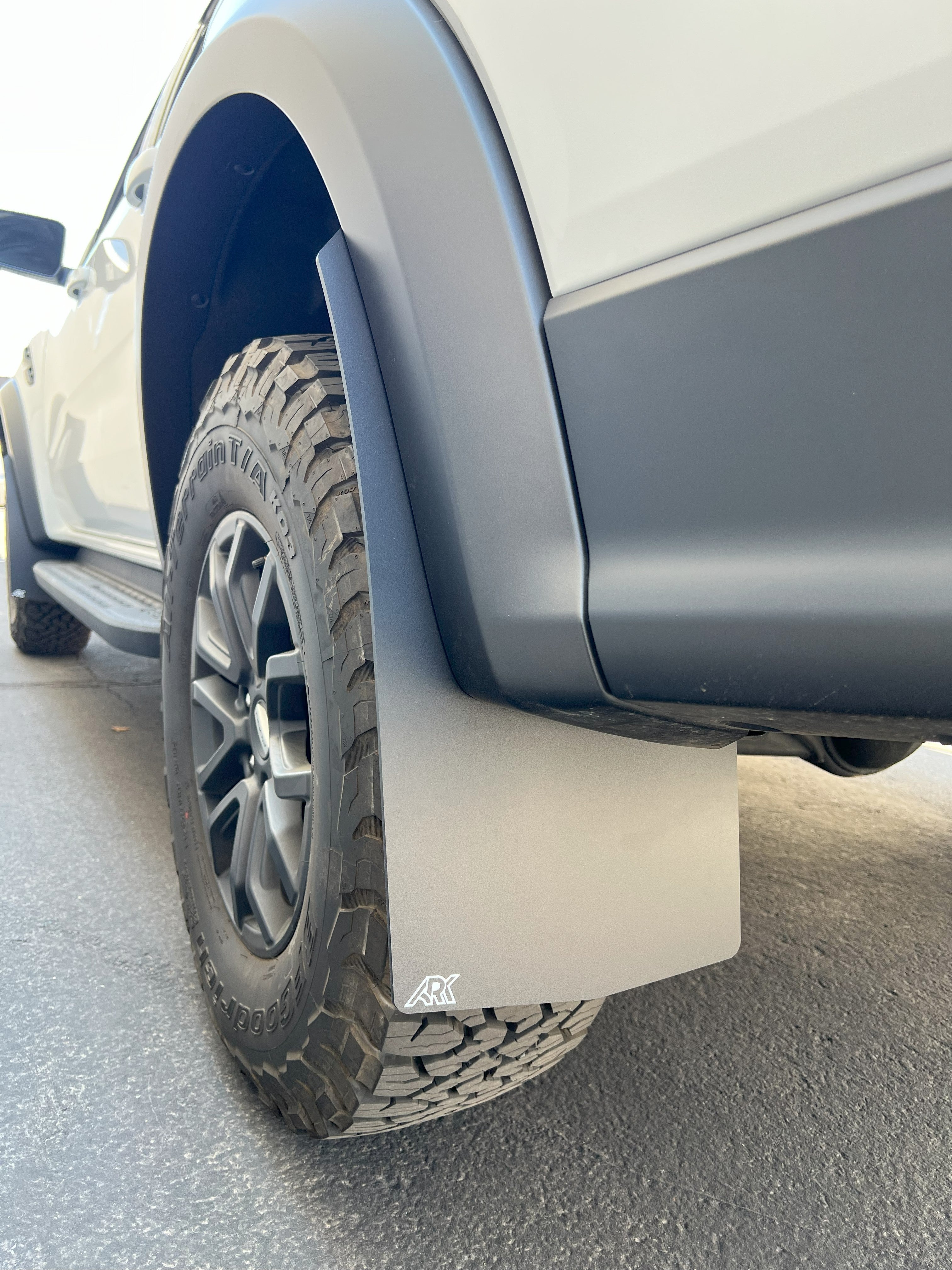 2024+ Ford Ranger Raptor TriXPoly Mud Flaps installed on a truck, showcasing durable protection and rugged design.