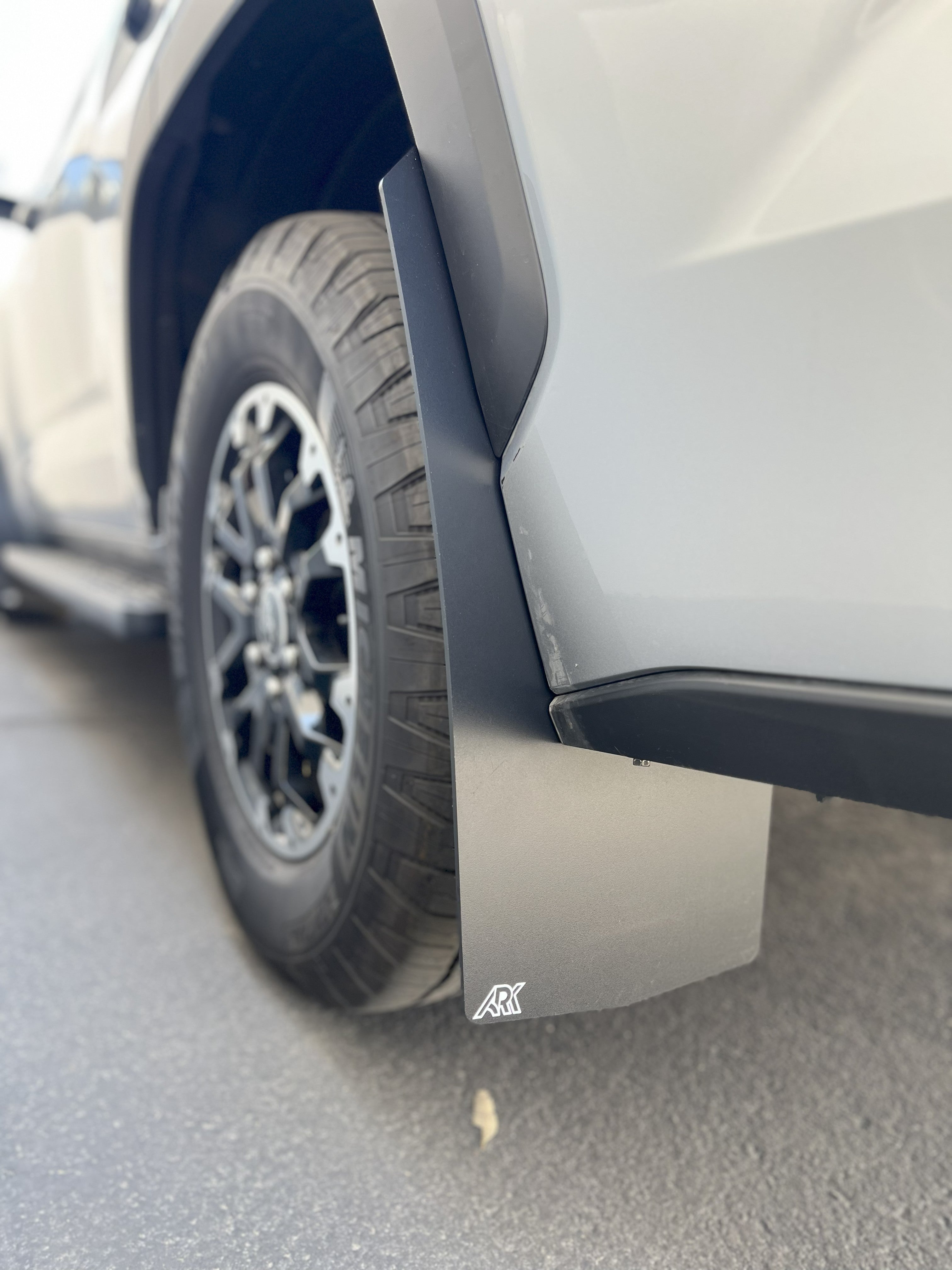 2022+ Toyota Sequoia TriXPoly Mudflaps installed on a vehicle, showcasing durability and protection against mud and debris.