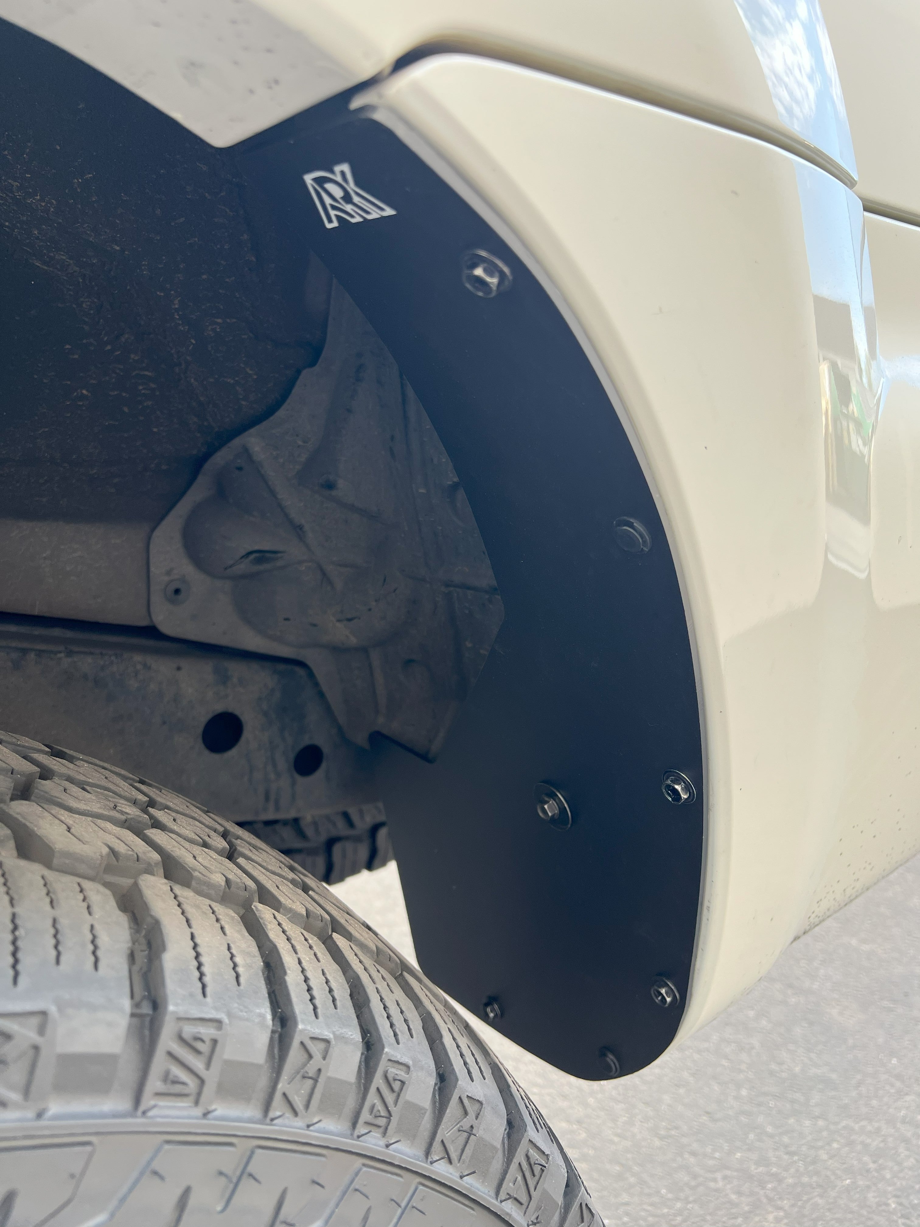 2006-2009 Toyota 4Runner TriXPoly Mud Flap Deletes showcasing a sleek design mounted near the tire for enhanced offroad performance.