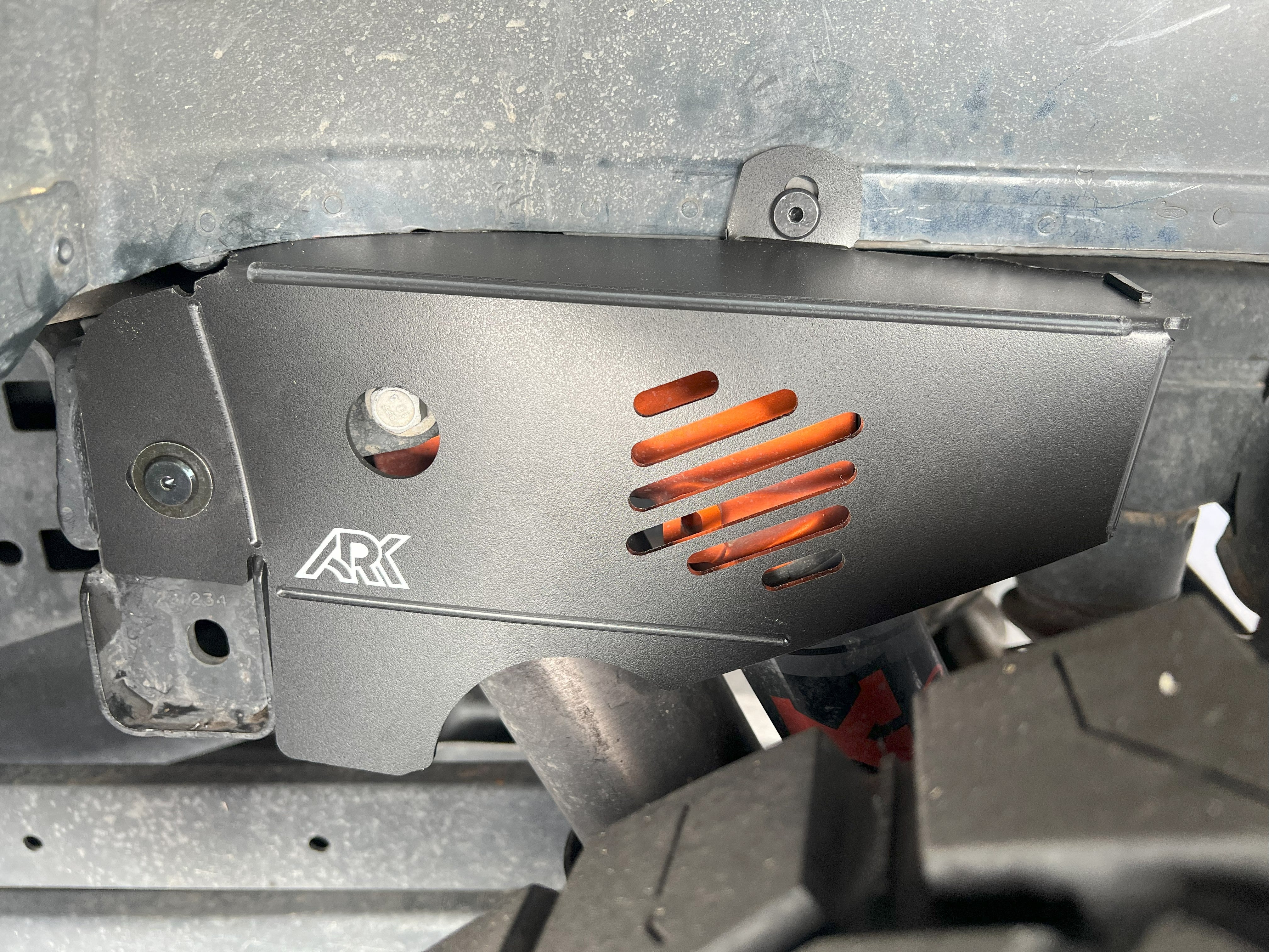 2021+ Ford Raptor strut protection panel featuring a sleek design and ventilation slots for enhanced durability and performance.