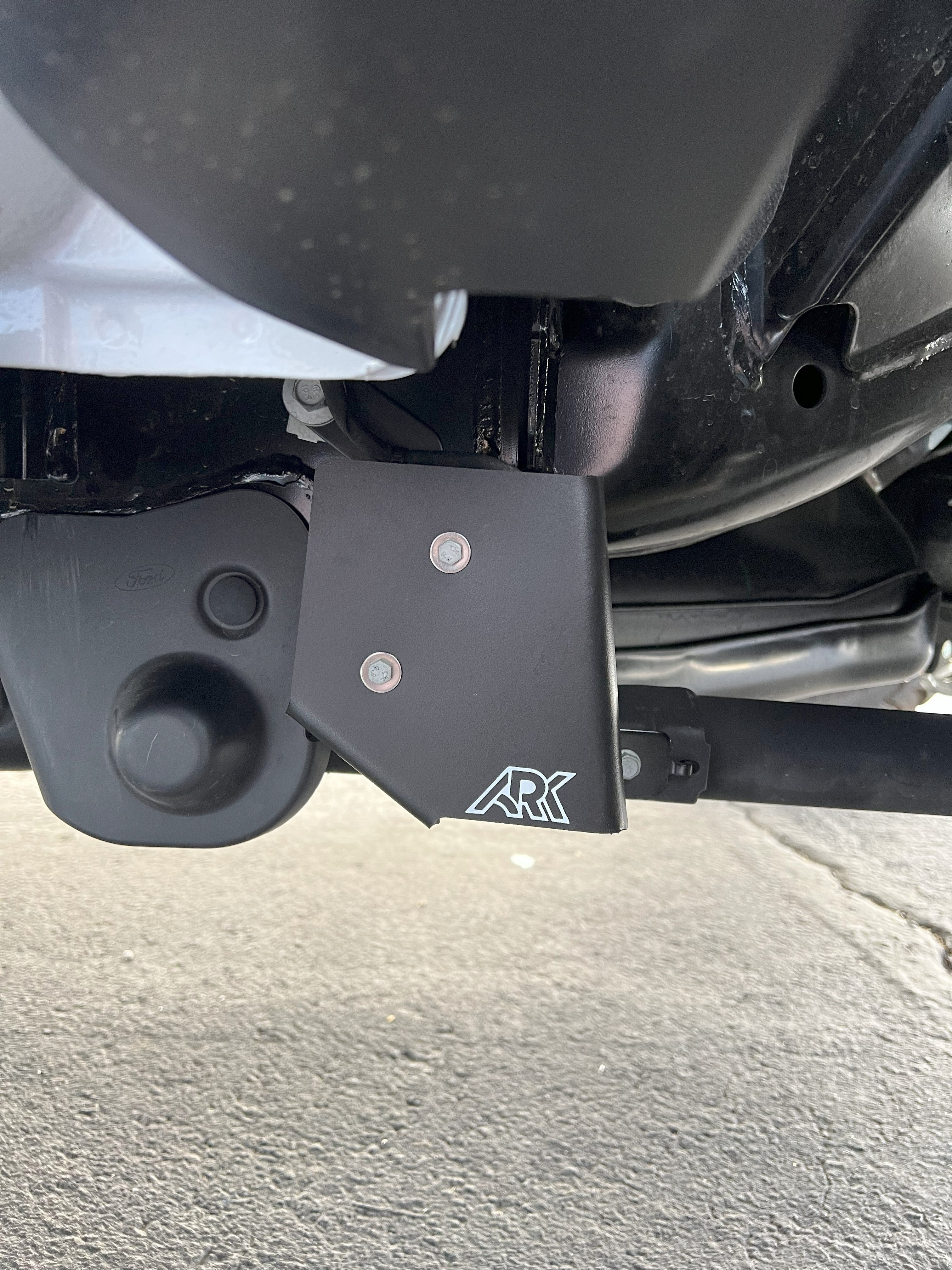 2024+ Ford Ranger Raptor TriXPoly rear suspension travel sensor guards installed, providing protection and durability.