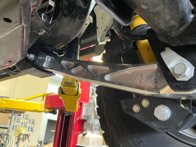Billet aluminum lower suspension arms for 2021 and up Bronco, showcasing durability and performance under the vehicle.
