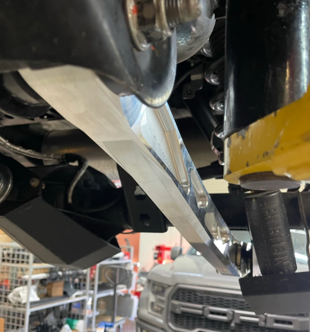 Billet aluminum lower rear suspension arms installed on a 2021 and up Bronco, showcasing durability and performance.