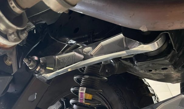 Billet aluminum upper arms for 2021 and up Bronco rear suspension, showcasing durable design and installation details.