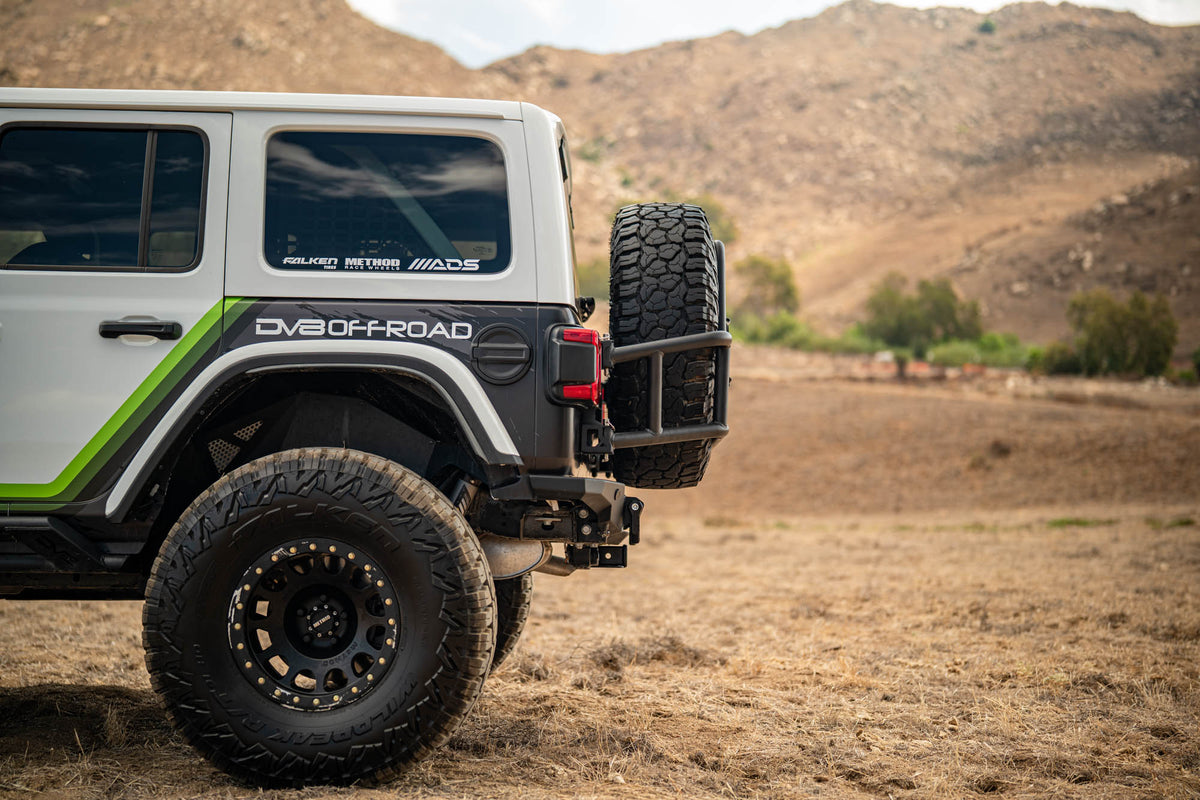 2018 2025 Jeep Wrangler JL Body Mounted Tire Carrier DV8 Offroad