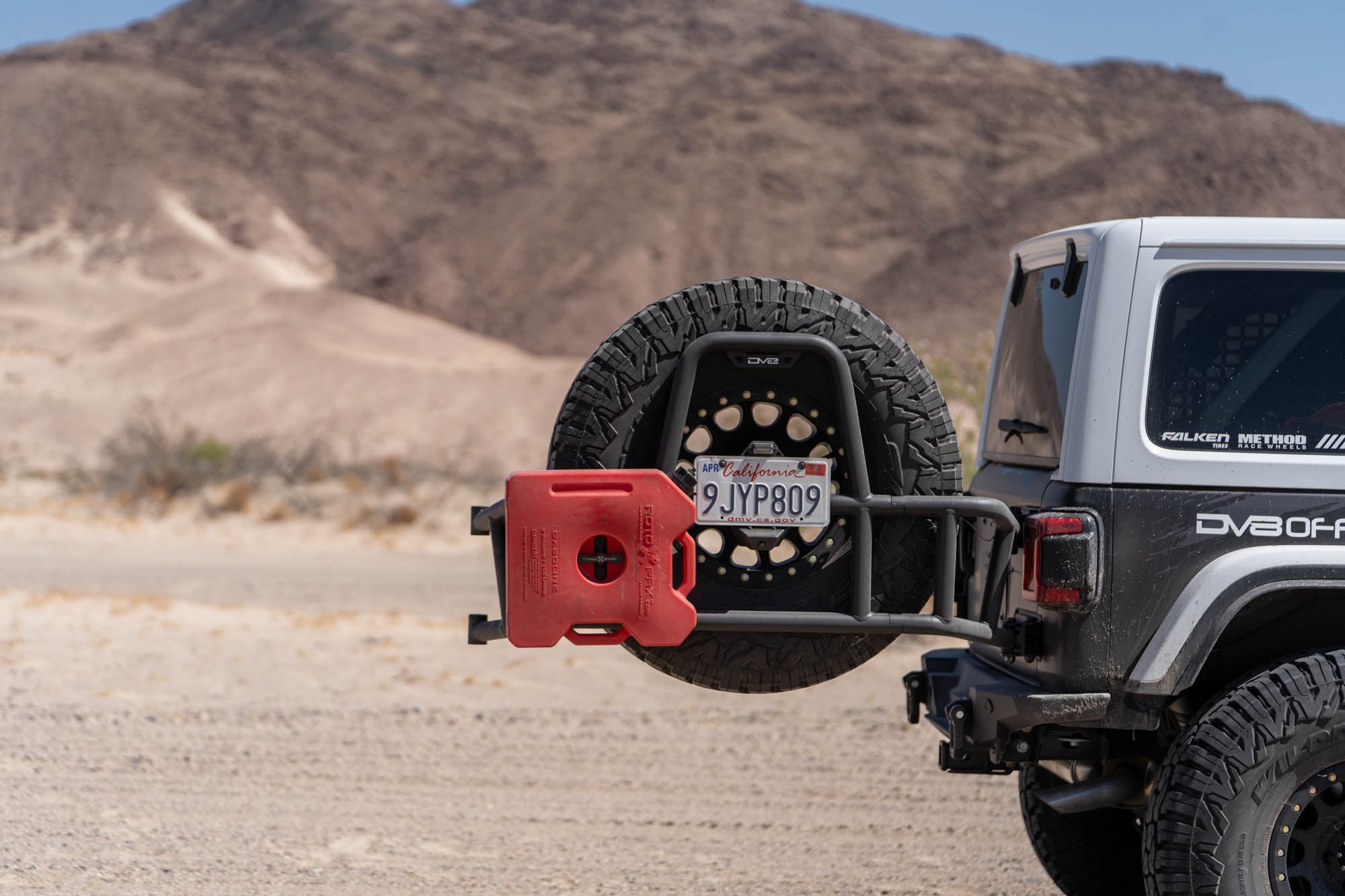2018 2025 Jeep Wrangler JL Body Mounted Tire Carrier DV8 Offroad