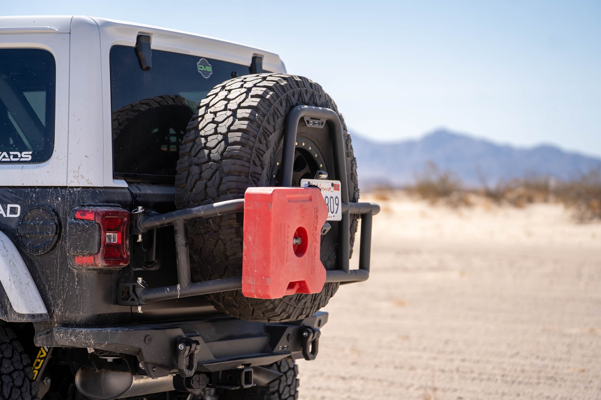 2018 2025 Jeep Wrangler JL Body Mounted Tire Carrier DV8 Offroad